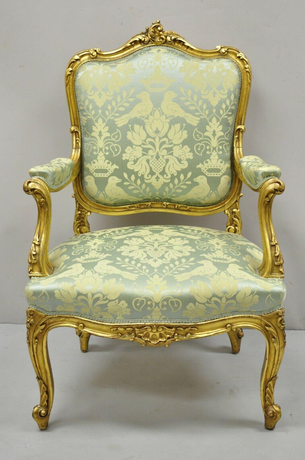 Antique French Rococo Louis XV Victorian Gold Giltwood Green Silk Parlor Chair. Item features a carved gold giltwood frame, green silk upholstery, upholstered armrests, nicely carved details, cabriole legs, very nice antique item, great style and