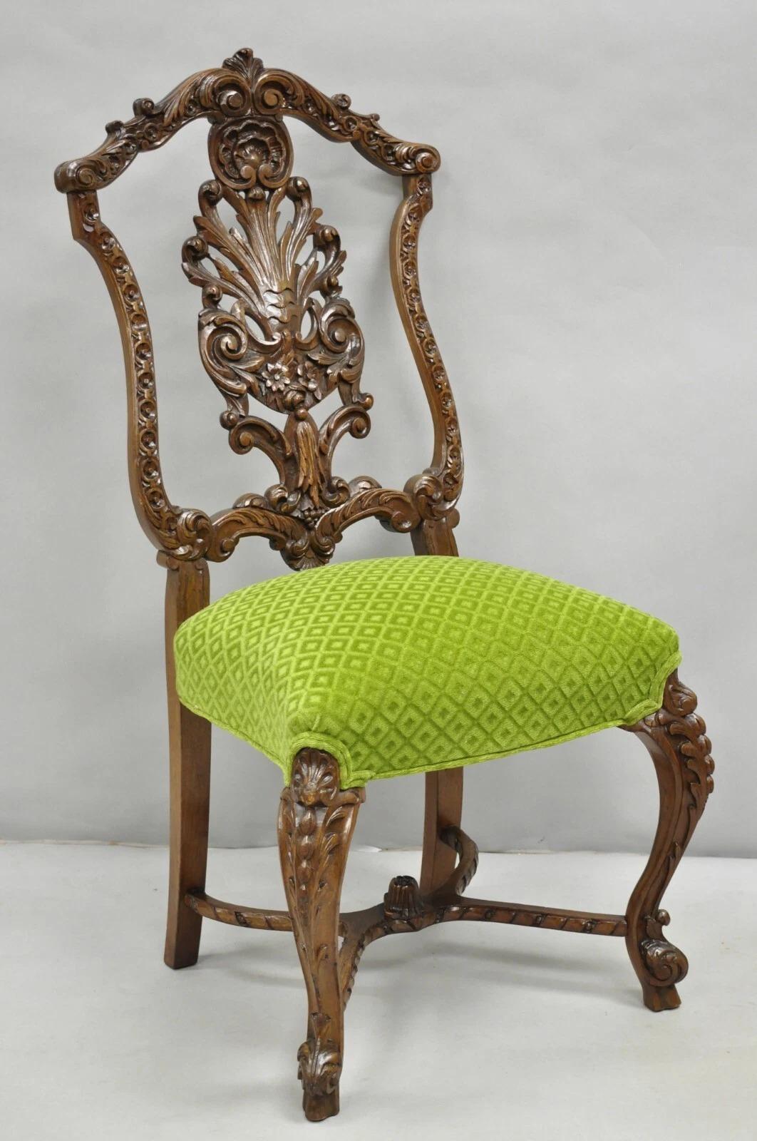 Antique French Rococo Revival Ornately Carved Walnut Dining Side Chairs with Carved Stretcher Bases and Green Upholstered Seats  - Set of 6. Original custom plastic covers included (see pic 10). Circa Early 20th Century. Measurements: 43