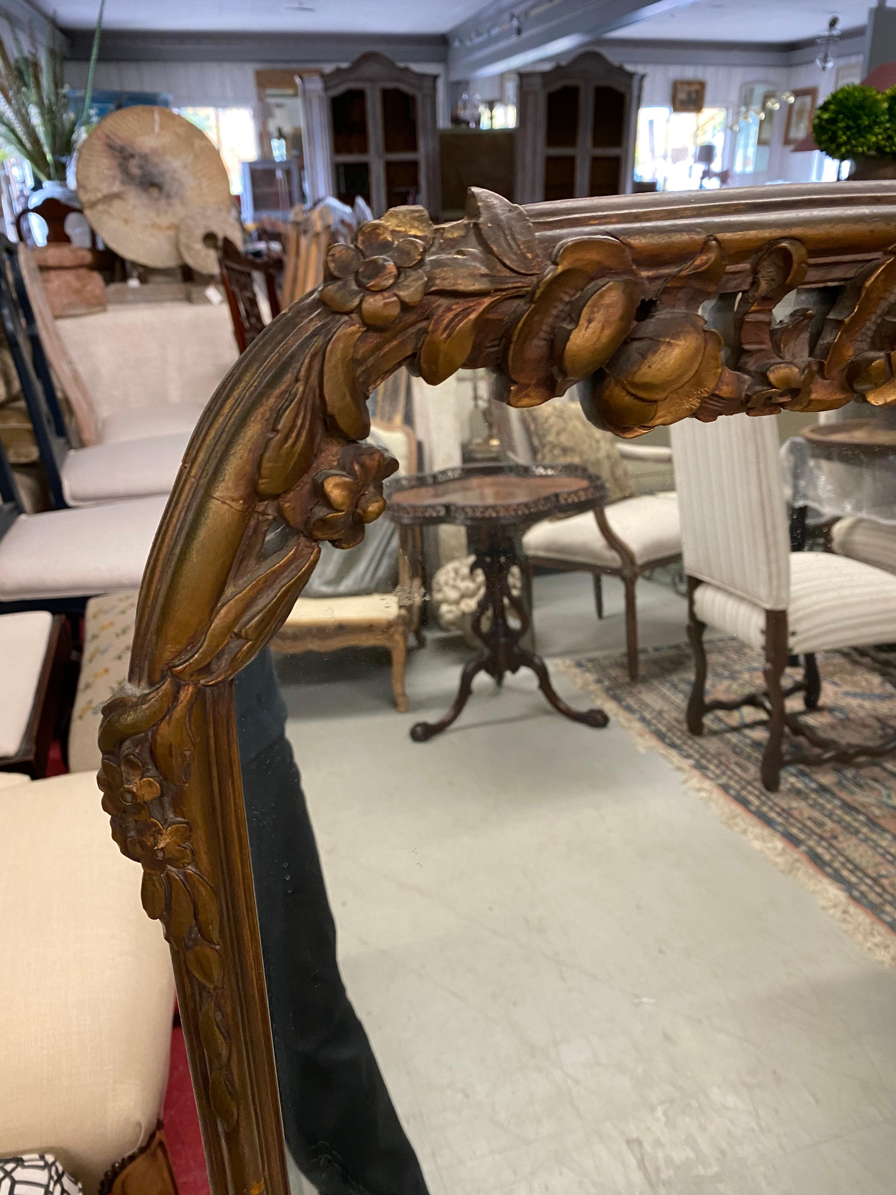 Antique French Rococo style arch top wall mirror with bow motif.
Great as mantel mirror, fireplace mirror, pier mirror, console or Trumeau mirror.
Versatile styling, suitable for Hollywood Regency, Baroque, French Classic or country decor.
  