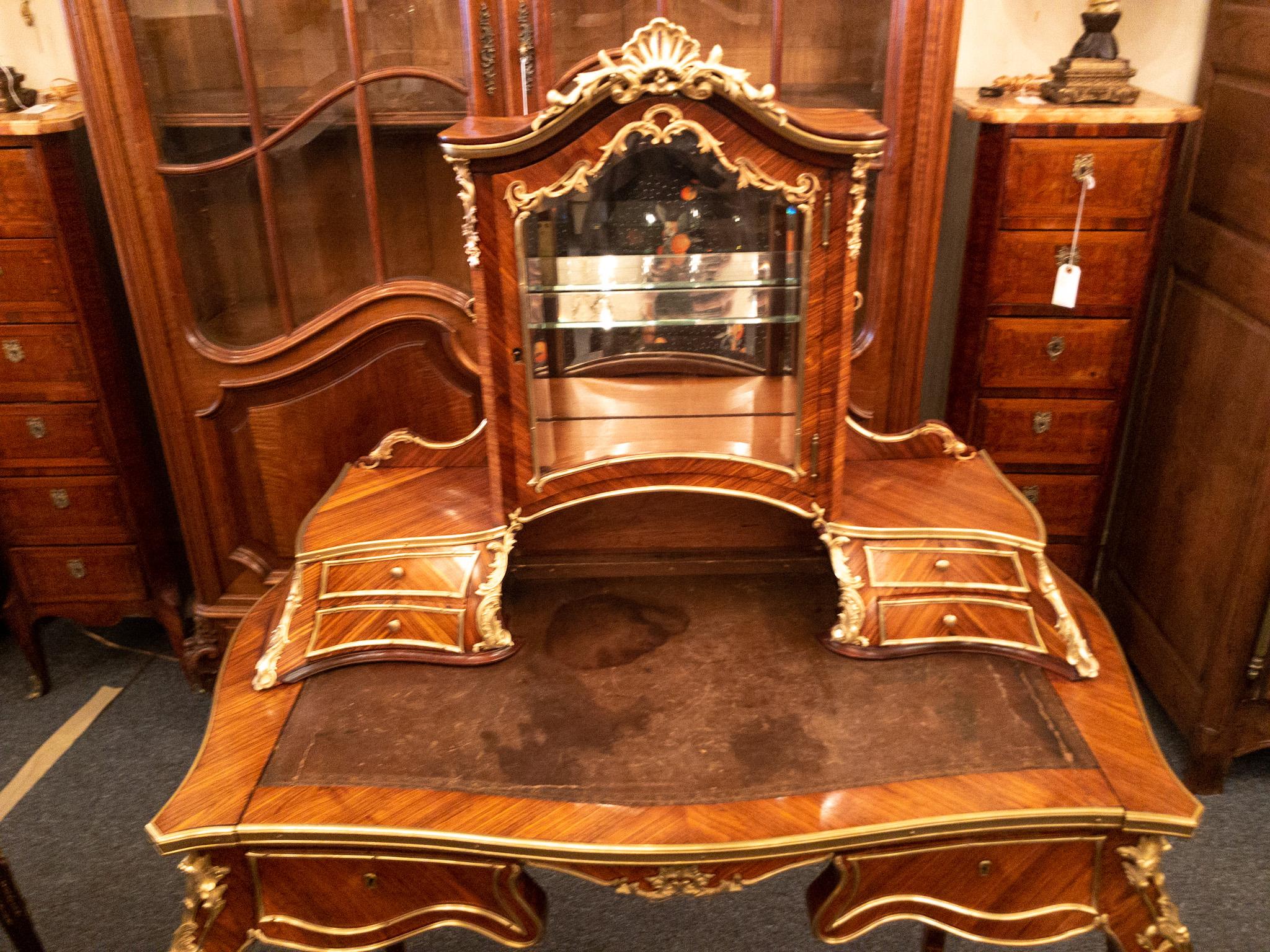 Antique French rosewood and gold bronze writing desk, circa 1880-1890.