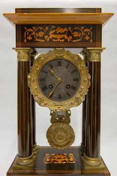 Reloj francés de pórtico en palisandro y madera satinada