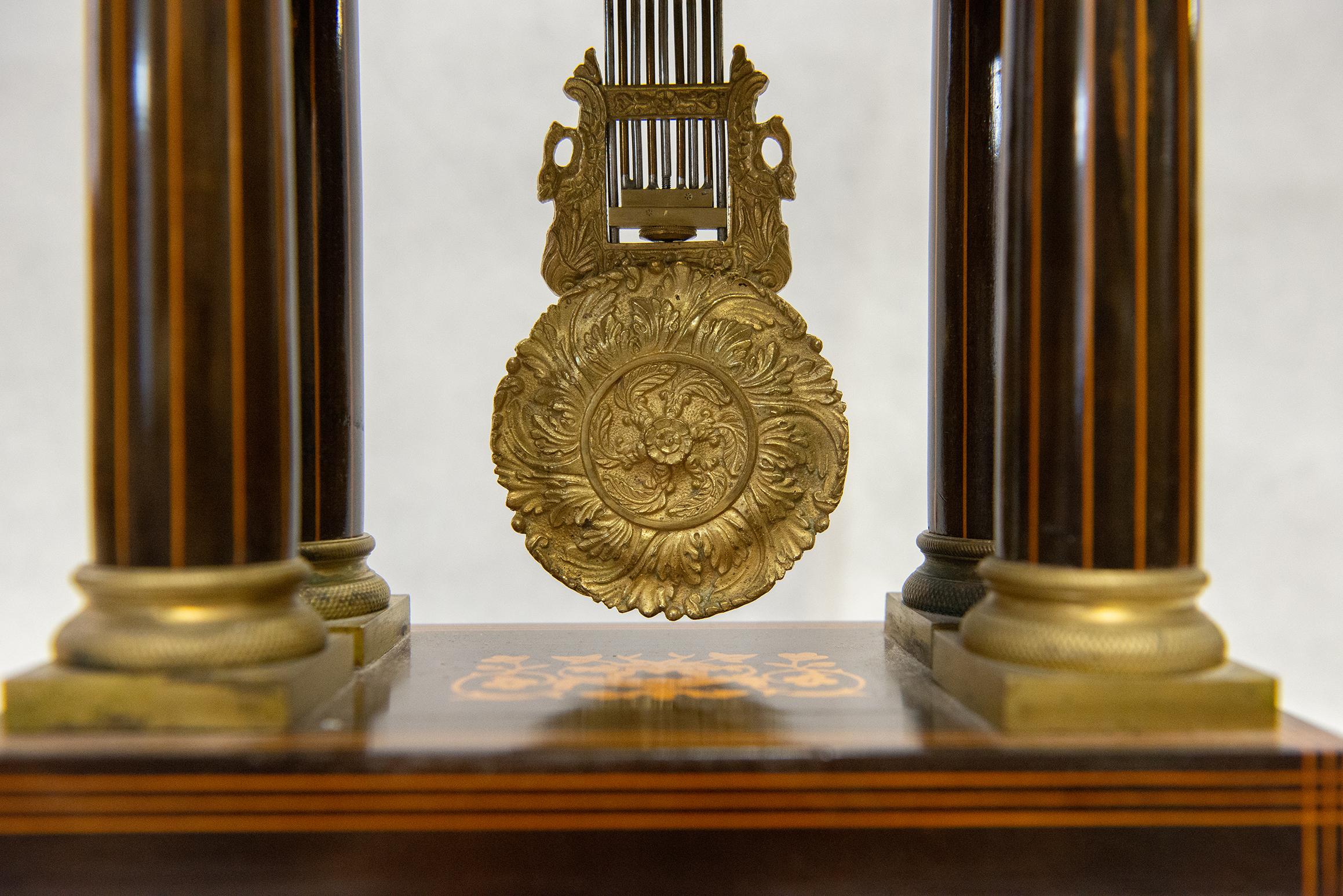 19th Century  French Rosewood and Satinwood Portico Clock For Sale