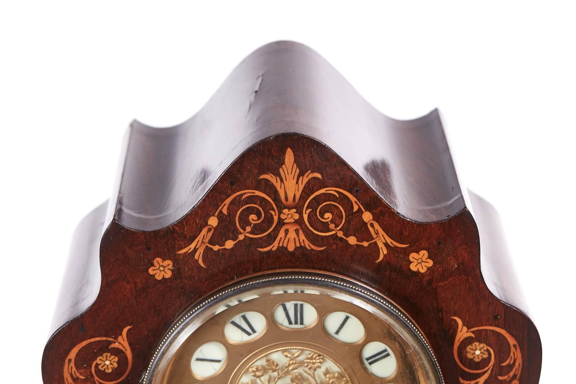 Antique French rosewood marquetry inlaid 8 day mantel clock, with a lovely shaped marquetry inlaid case 8 day movement with a roman numerated dial
Lovely color and condition
Working older
Measures: 10
