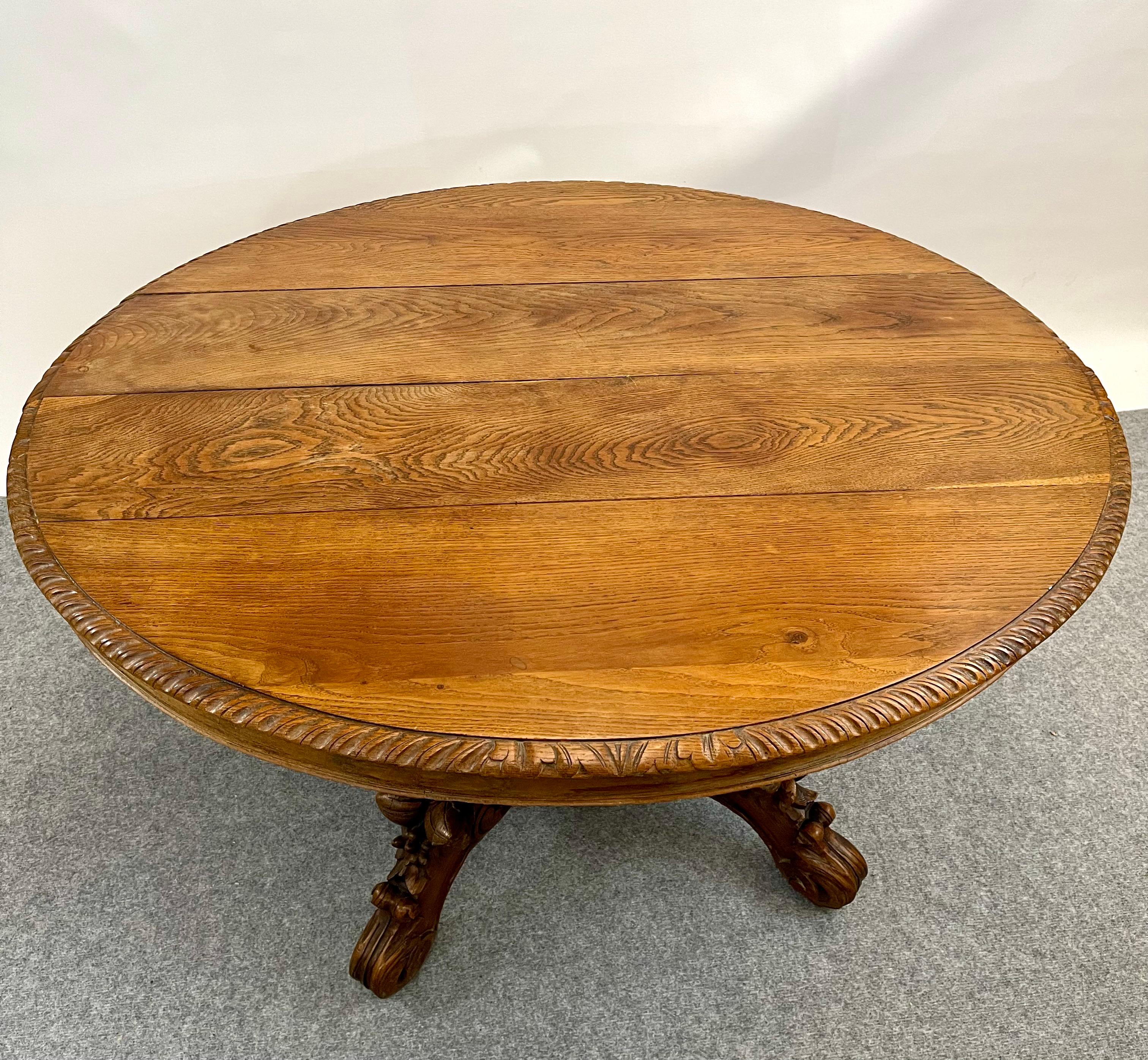 Oak Antique French round coffee table pedestal Black Forest hunt table griffons 19th For Sale