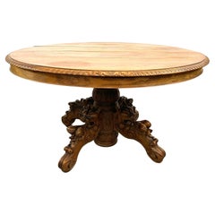 Ancienne table basse ronde française à piédestal Black Forest hunt table griffons 19ème siècle