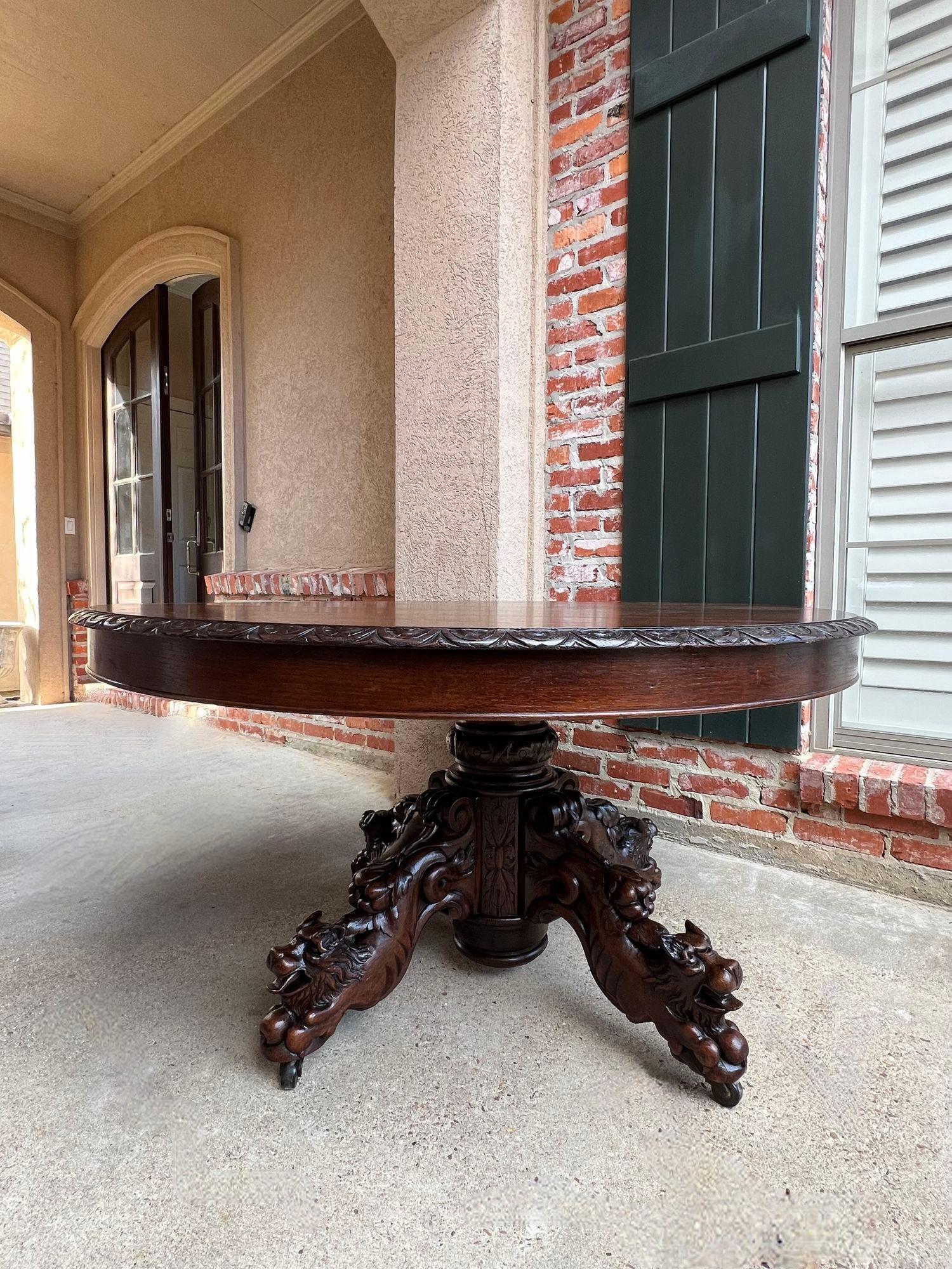 French Provincial Antique French ROUND Dining Hunt Game Table Carved Oak Black Forest Pedestal For Sale