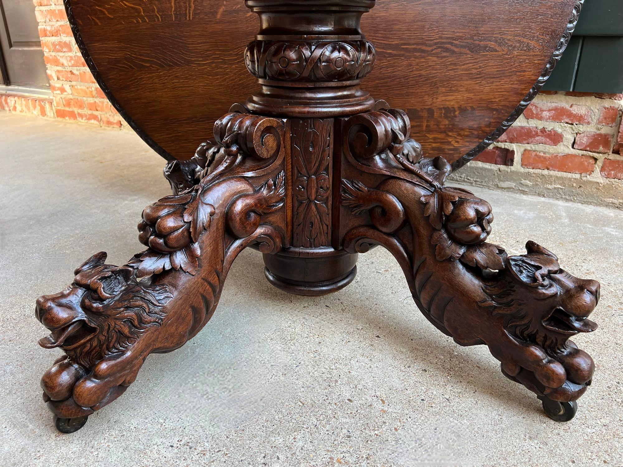Antique French ROUND Dining Hunt Game Table Carved Oak Black Forest Pedestal In Excellent Condition For Sale In Shreveport, LA