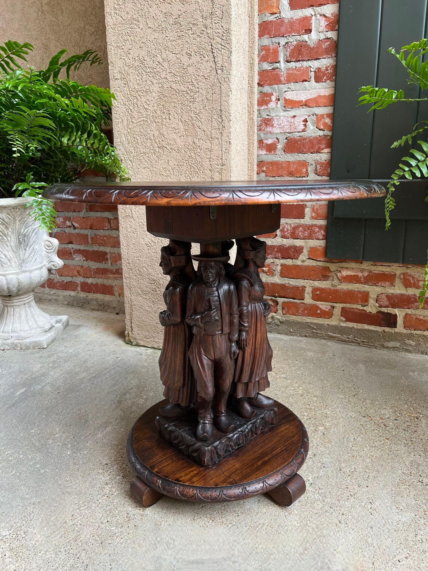 Antique French Round Side Lamp Table Breton Brittany Carved Oak Celtic.

Direct from France, a superbly hand carved antique French side table in a very versatile small size with a ROUND top!
The table pedestal is an example of superb carvings