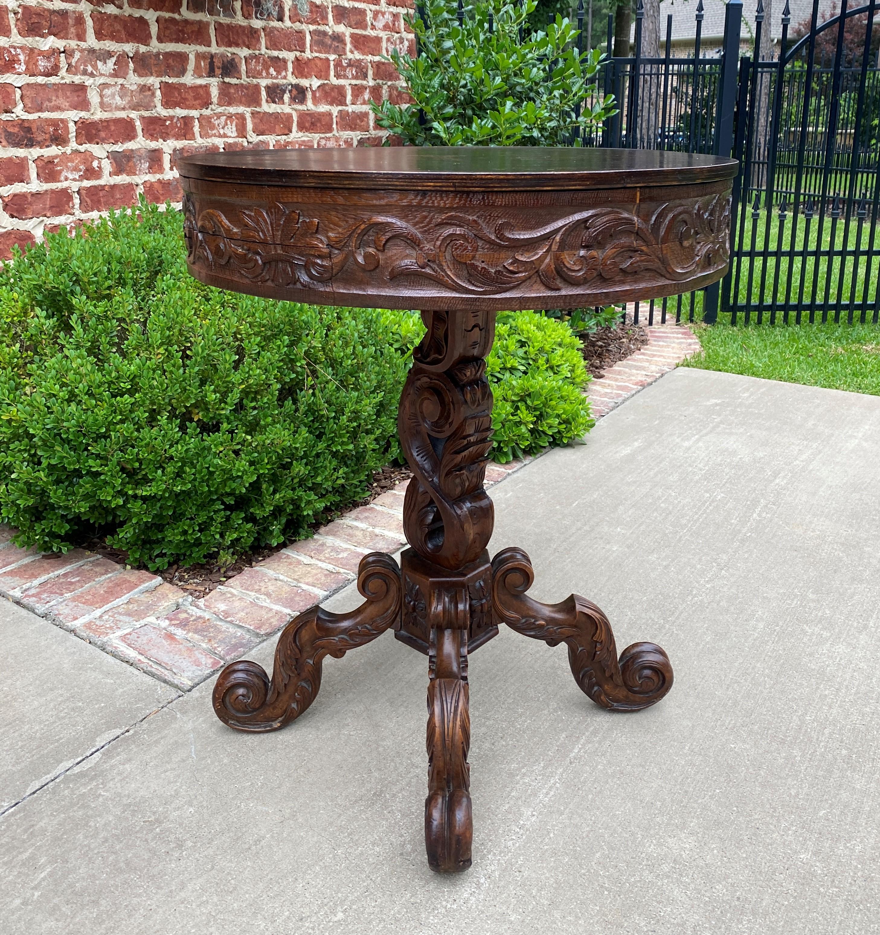 Superb highly carved late 19th century antique Oak round entry, hall, sofa, center, foyer, or parlor table, end table, or pedestal~~Victorian Era Renaissance Revival
~~c. 1890s

These versatile tables were very popular in late Victorian era