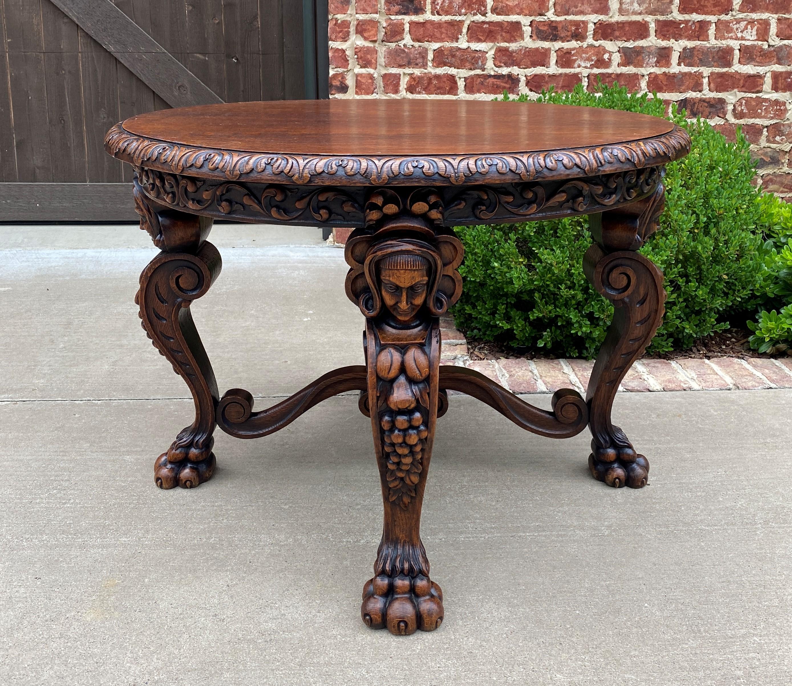 Superb highly carved late 19th century antique oak round entry, coffee, sofa, center, parlor or end table ~~Victorian Era Renaissance Revival
~~c. 1890s

These versatile tables were very popular in late Victorian era French country homes and