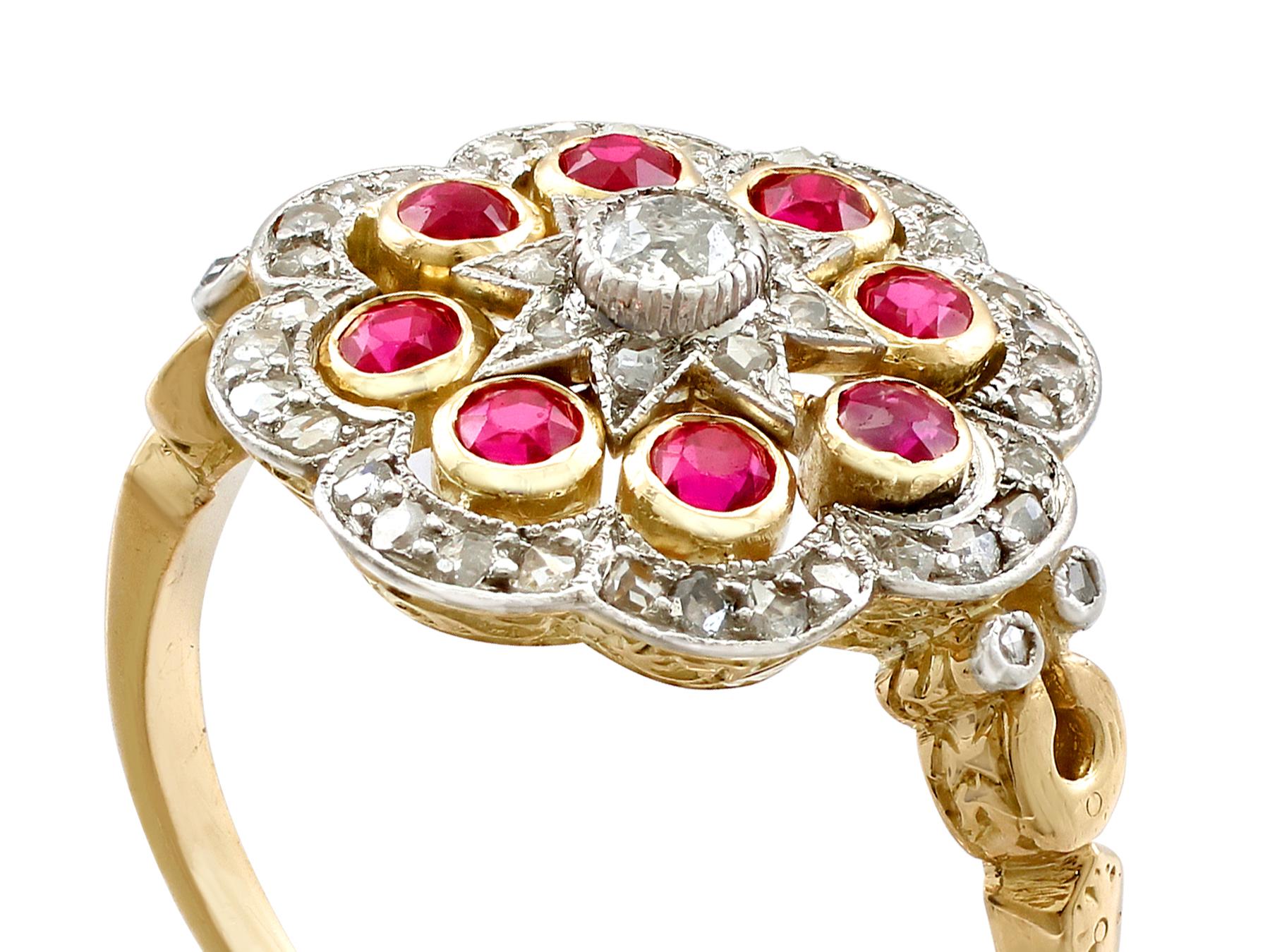 An impressive antique French 0.75 carat ruby and 0.52 carat diamond, 18 karat yellow gold and platinum set dress ring; part of our diverse antique jewelry and estate jewelry collections.

This fine and impressive antique ruby ring has been crafted