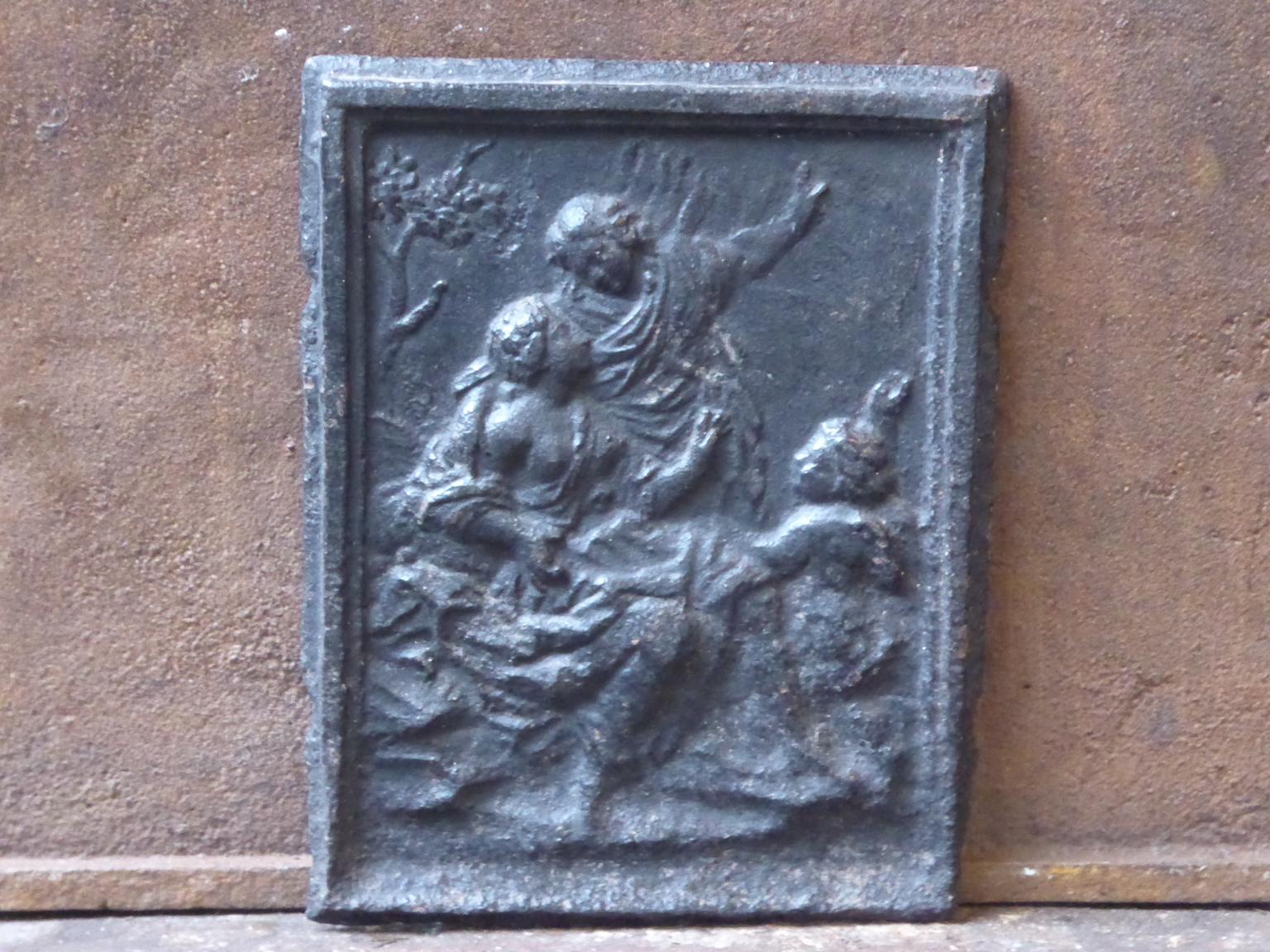 18th-19th century French neoclassical fireback with a rural scene. The fireback is made of cast iron. The patina is black / pewter.