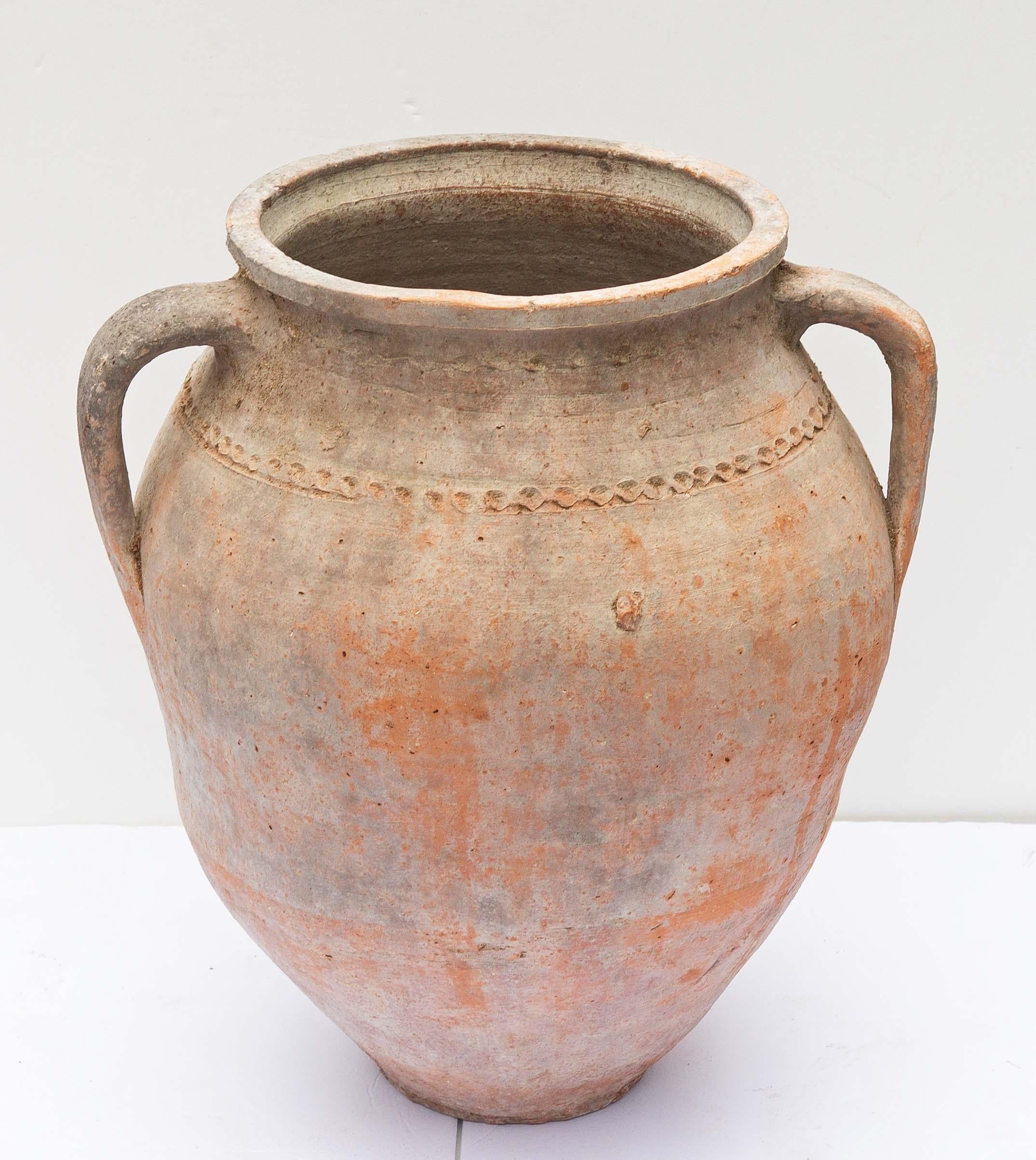 Antique French provincial terracotta amphora. Hand thrown  clay. Circa 1900. 