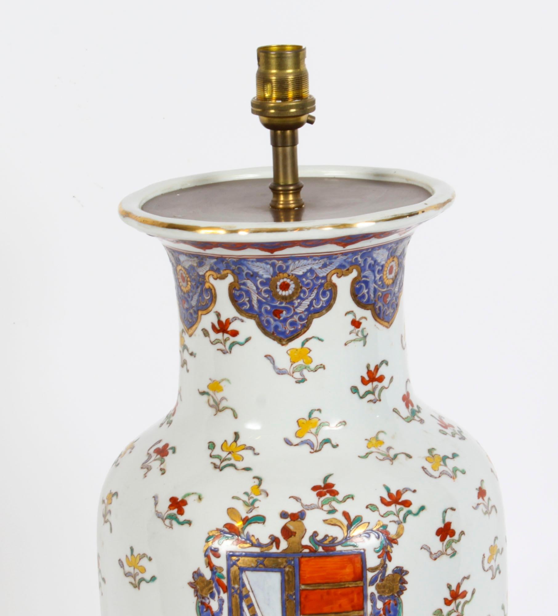 A beautiful large French Samson porcelain lamp with hand painted scenes and delicate gilt decoration, dating from C 1880. 
 
The baluster shaped lamp features hand painted armorial decoration in the Chinese Export taste, now mounted as a lamp on a