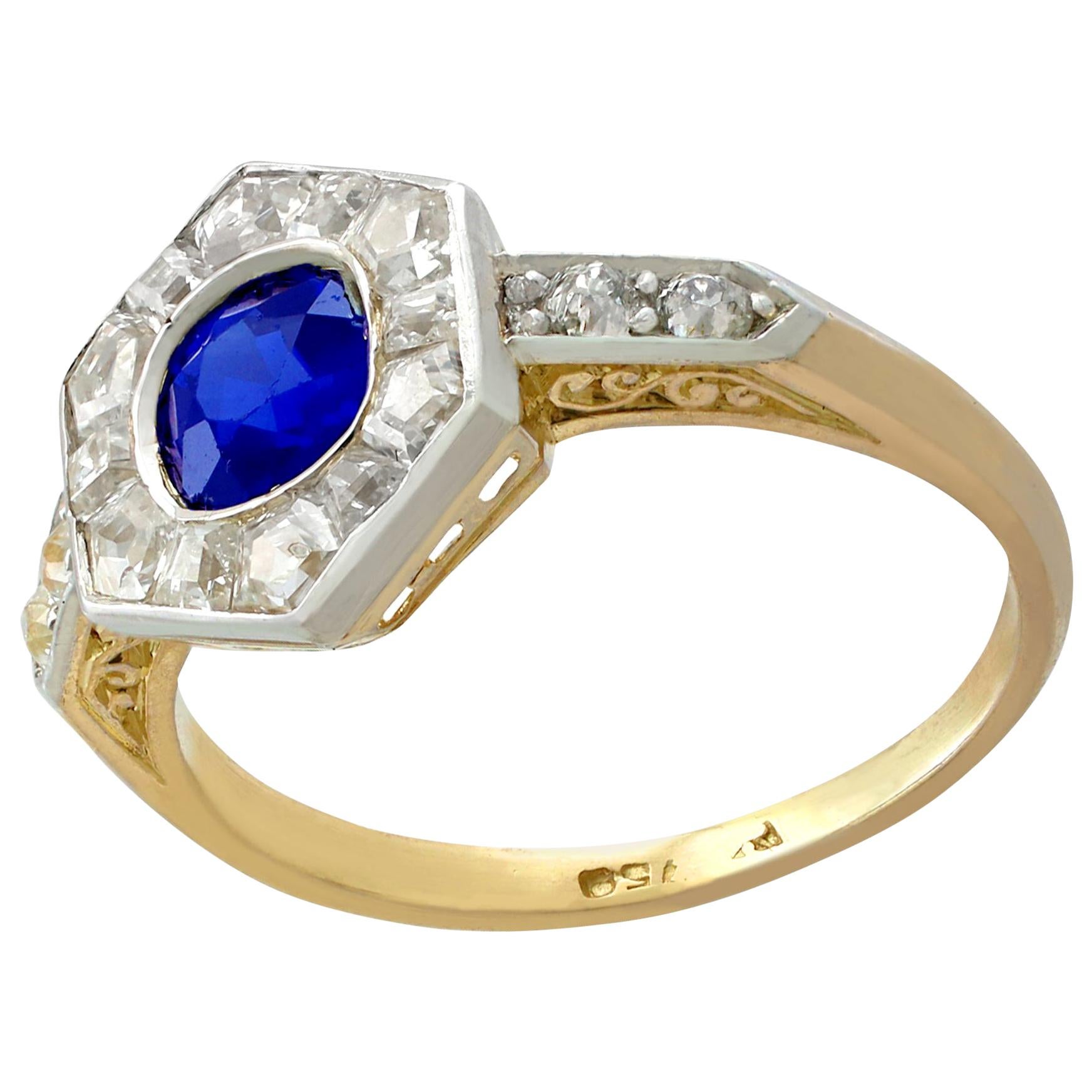 A stunning antique 0.81 carat sapphire and 0.71 carat diamond, 18 karat yellow gold and platinum set dress ring; part of our diverse antique jewellery and estate jewelry collections.

This stunning, fine and impressive antique 1920's blue sapphire