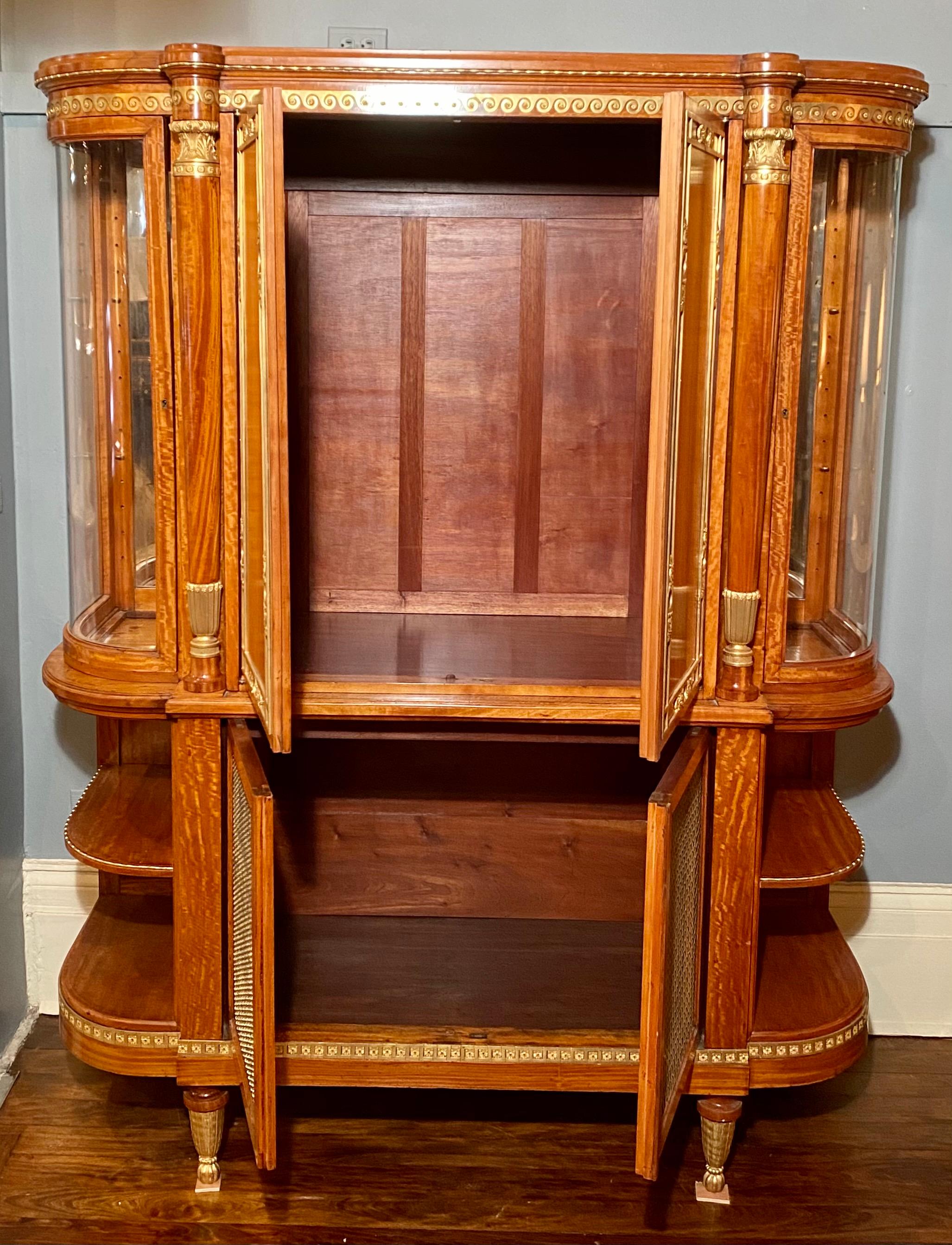 Antique French satinwood cabinet with bronze doré mounts, circa 1880.
 