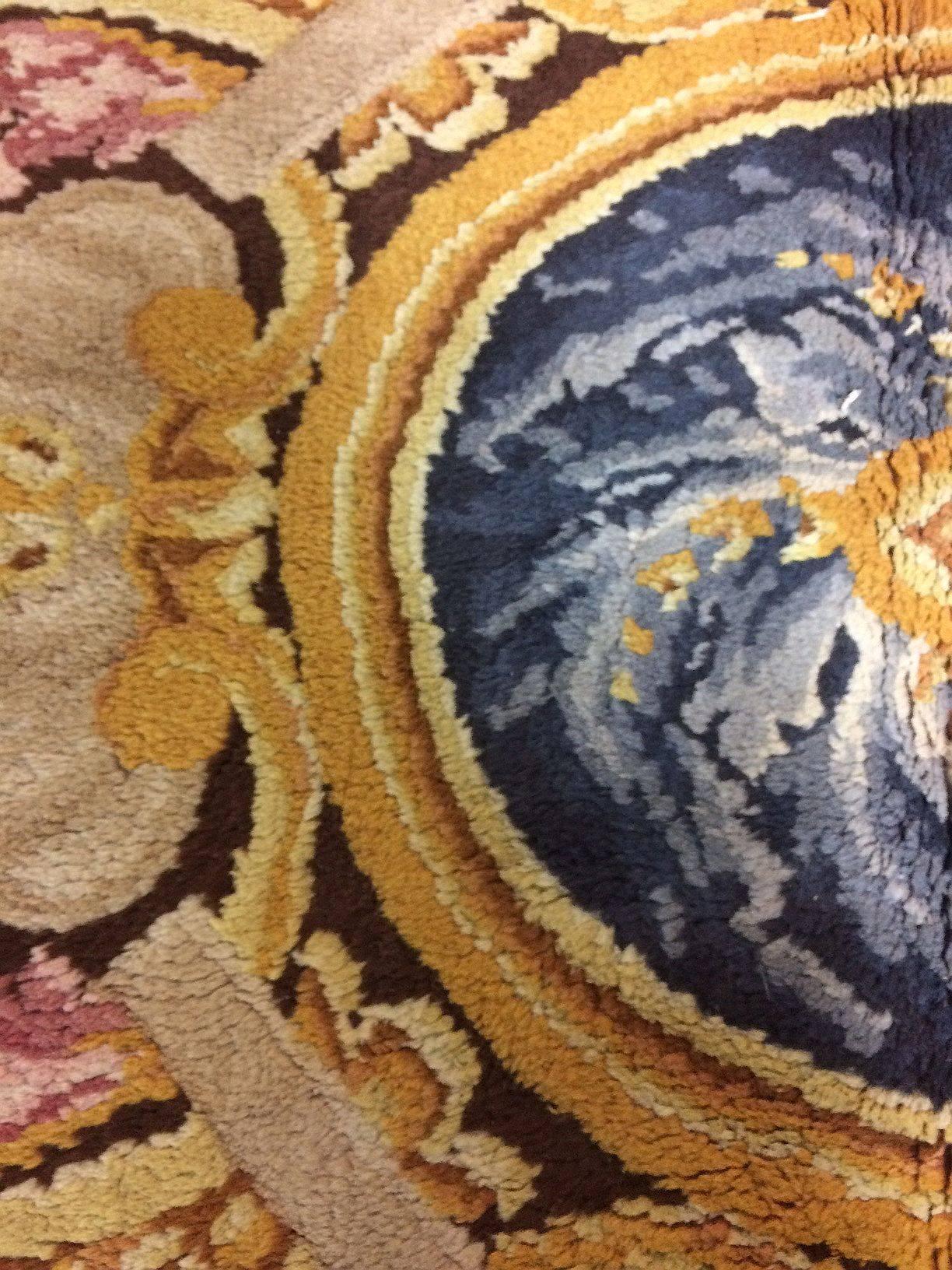 France, Aubusson Manufactory.
Late 19th century, Louis XV style, design by Pierre-Josse Perrot
Savonnerie knot carpet

This design is registered from 1735 in different sizes and colors. One was made for the King's bedroom in Palace of