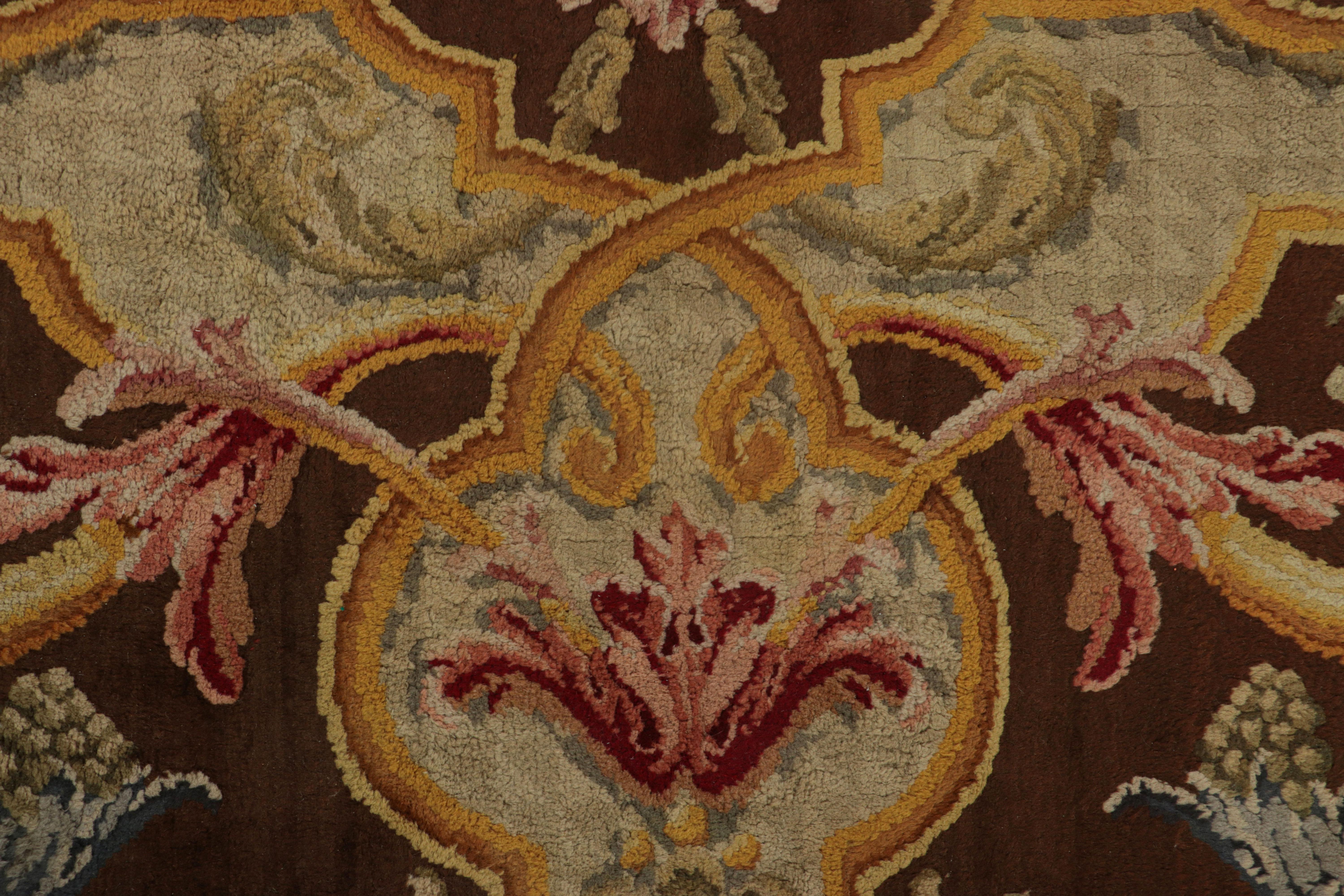 Hand-knotted in wool and originating in France circa 1850-1900, this 10x15 Antique French Savonnerie rug in the Neoclassical style is a rare masterpiece from Rug & Kilim’s European rug collection. 

On the Design: 

This antique rug enjoys a rich,