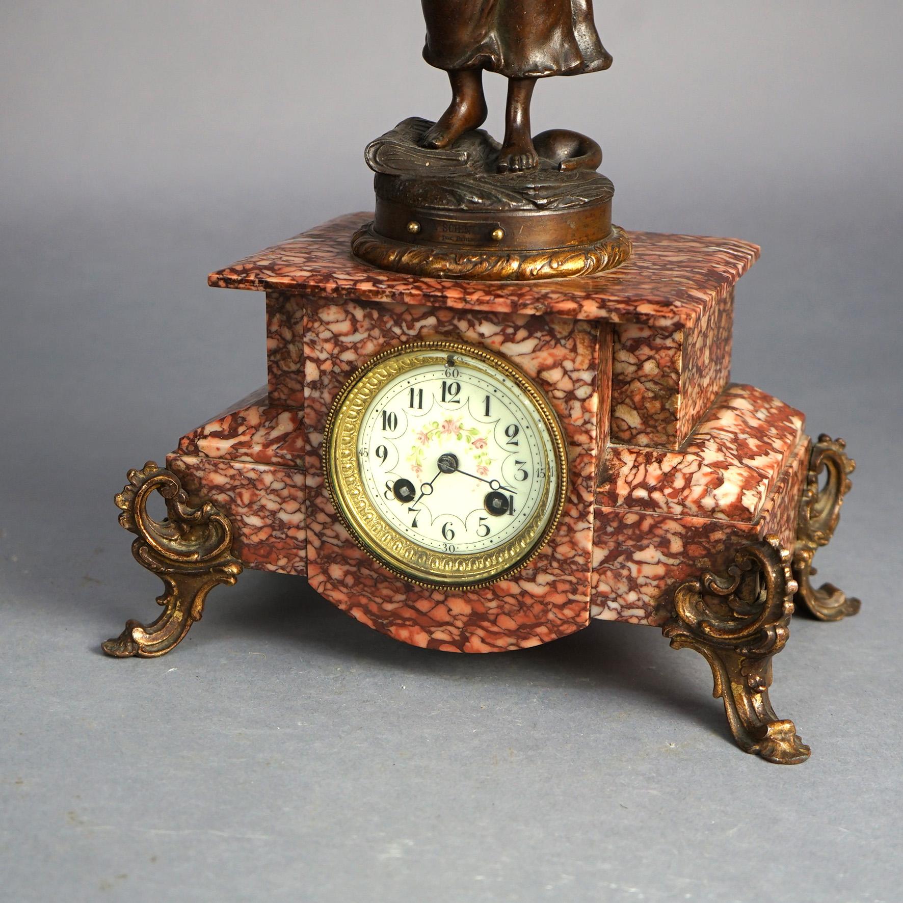 Effet bronze Horloge Scientia française ancienne, métal bronzé figuratif et pied en marbre rouge, vers 1890 en vente