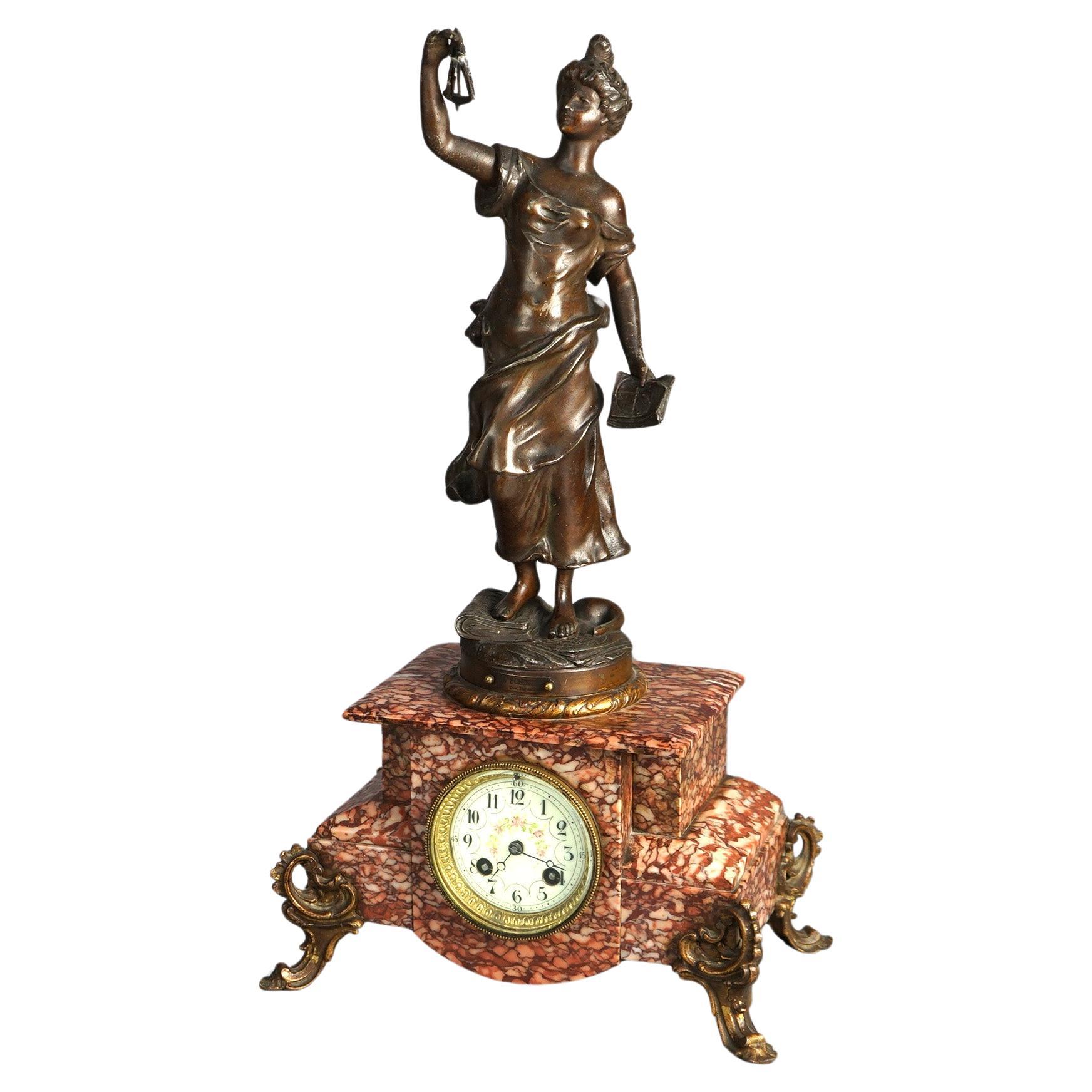 Horloge Scientia française ancienne, métal bronzé figuratif et pied en marbre rouge, vers 1890 en vente