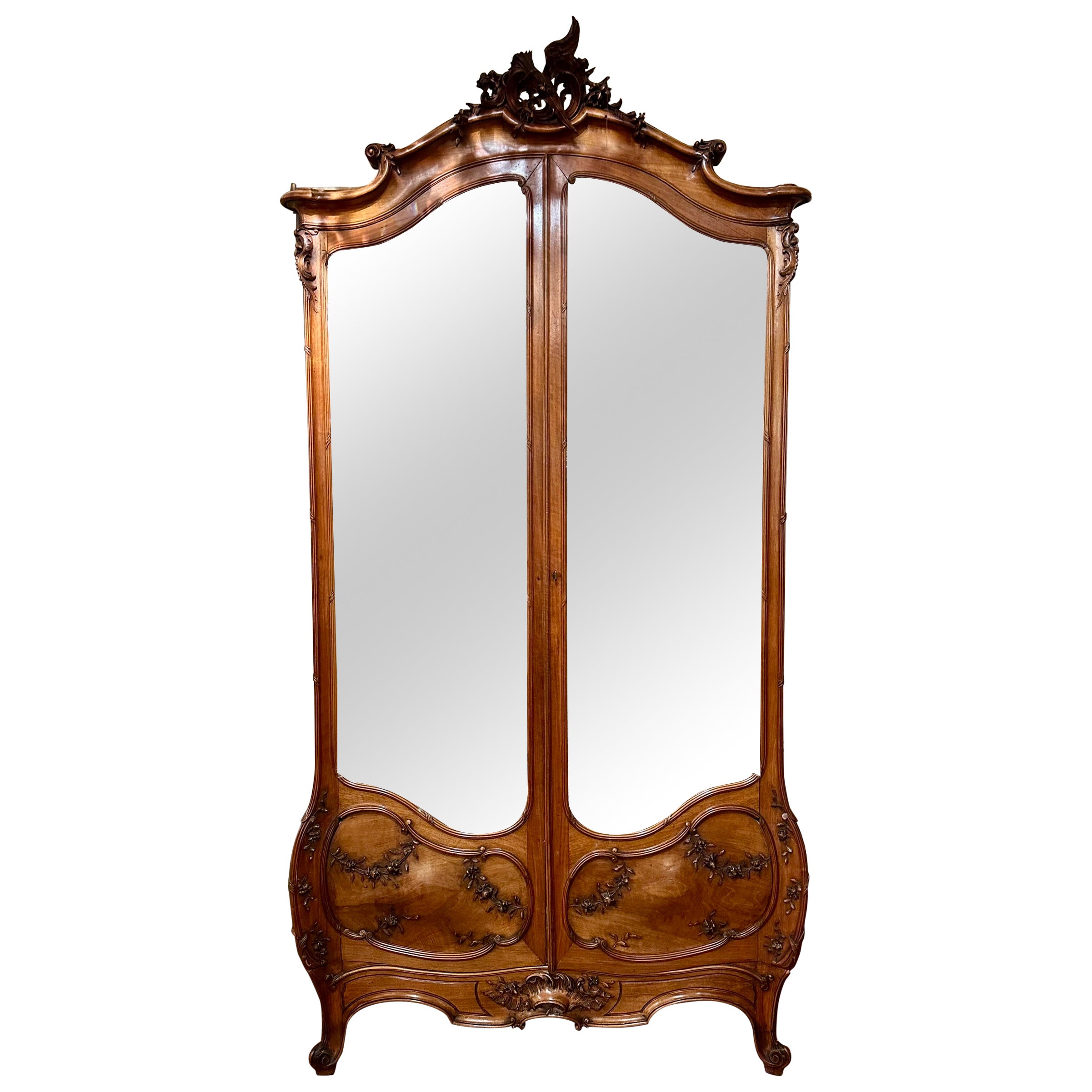 Antique French Sculpted Walnut & Mirrored Armoire Signed "Mercier" Circa 1890.
