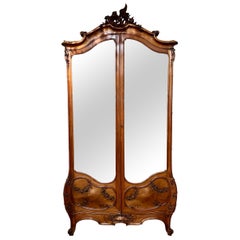 Antique French Sculpted Walnut & Mirrored Armoire Signed "Mercier" Circa 1890.