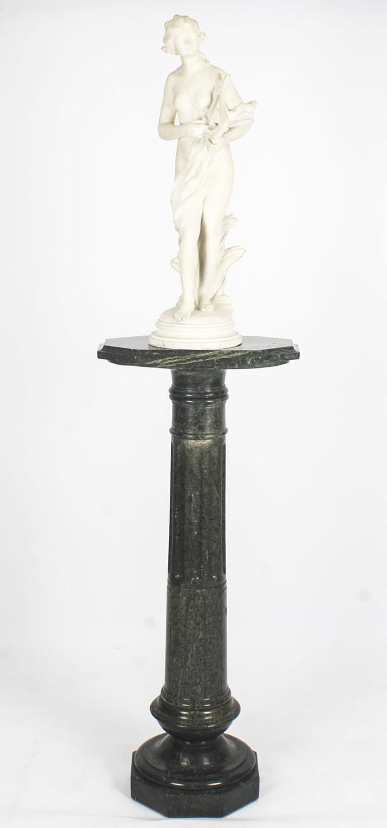 A lovely antique French Verde Antico green marble pedestal, late 19th century in date.

The pedestal is assembled in three interlocking sections and has a shaped rectangular moulded platform top which is raised on a turned and fluted column
