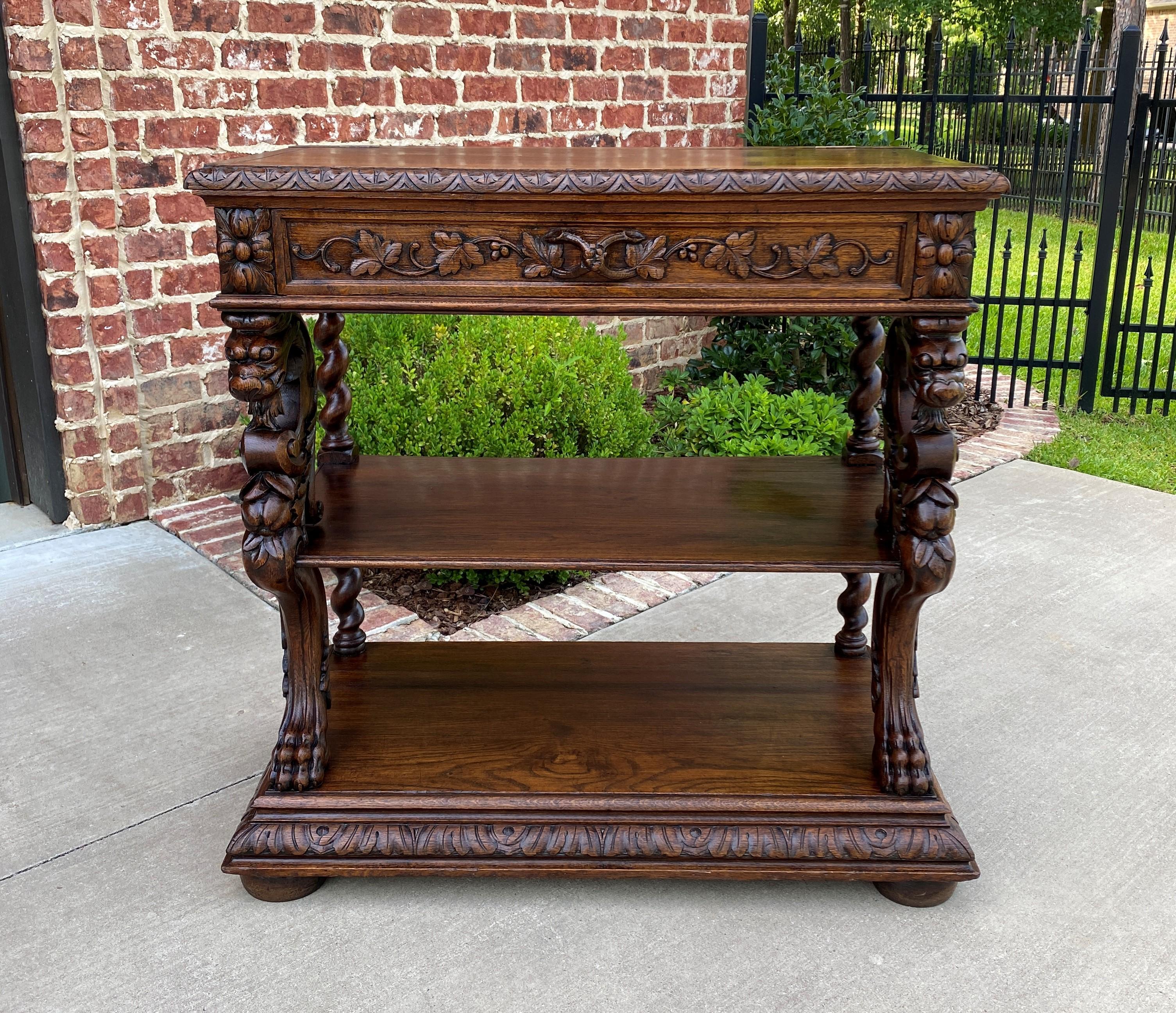 Charming and versatile antique French oak server, sideboard or buffet~~Renaissance Revival~~lift top marble~~c. 1880s

Relief -carved beveled edge top lifts to reveal original gray marble with nice veining~~Unique combination of carved bearded