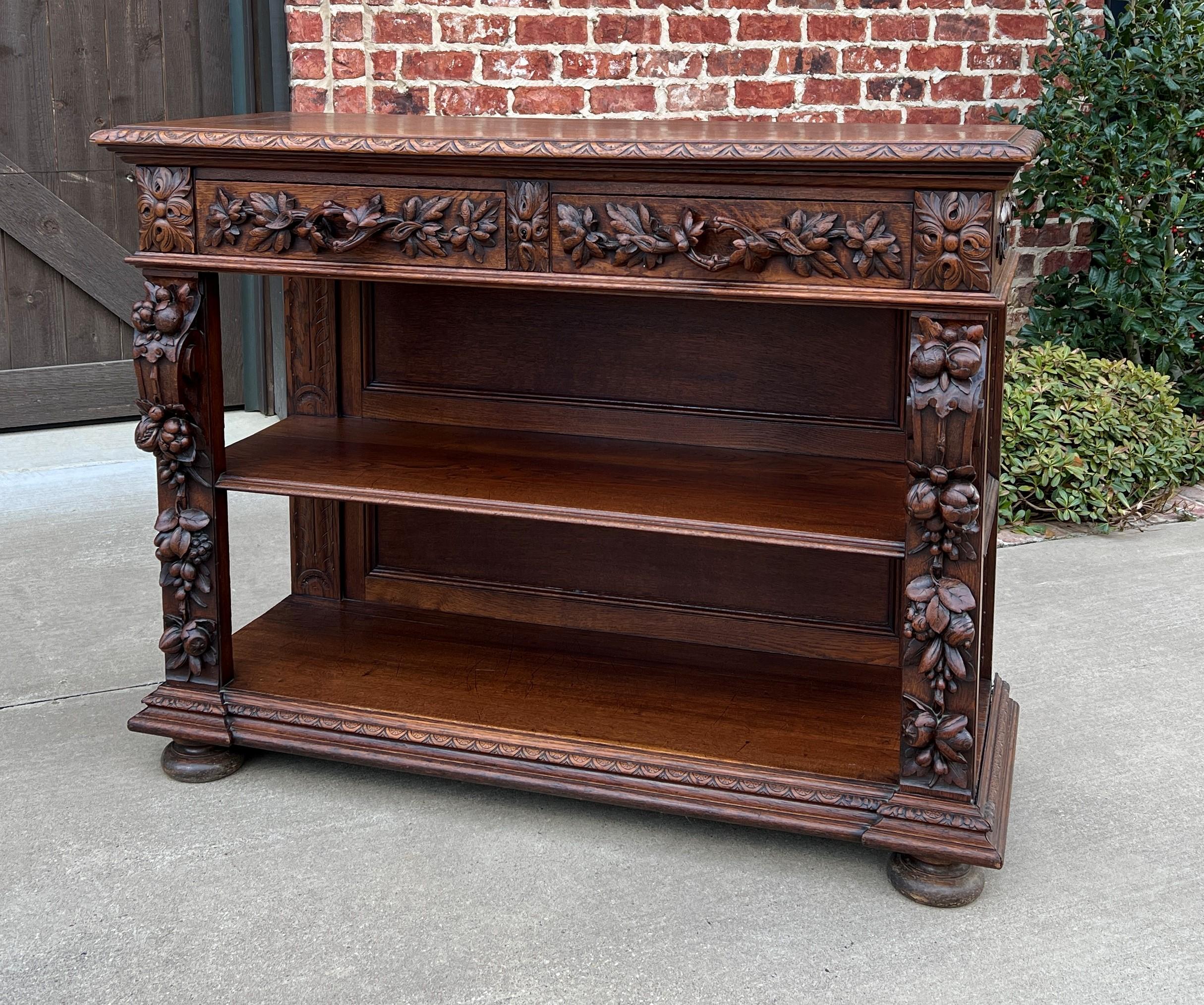 Exquisite antique French highly carved oak 3-tier console, sofa table or sideboard / server~~c. 1880s.

Highly carved antique French Renaissance Revival oak console, sofa table, sideboard or server~~excellent vine carved pulls and double