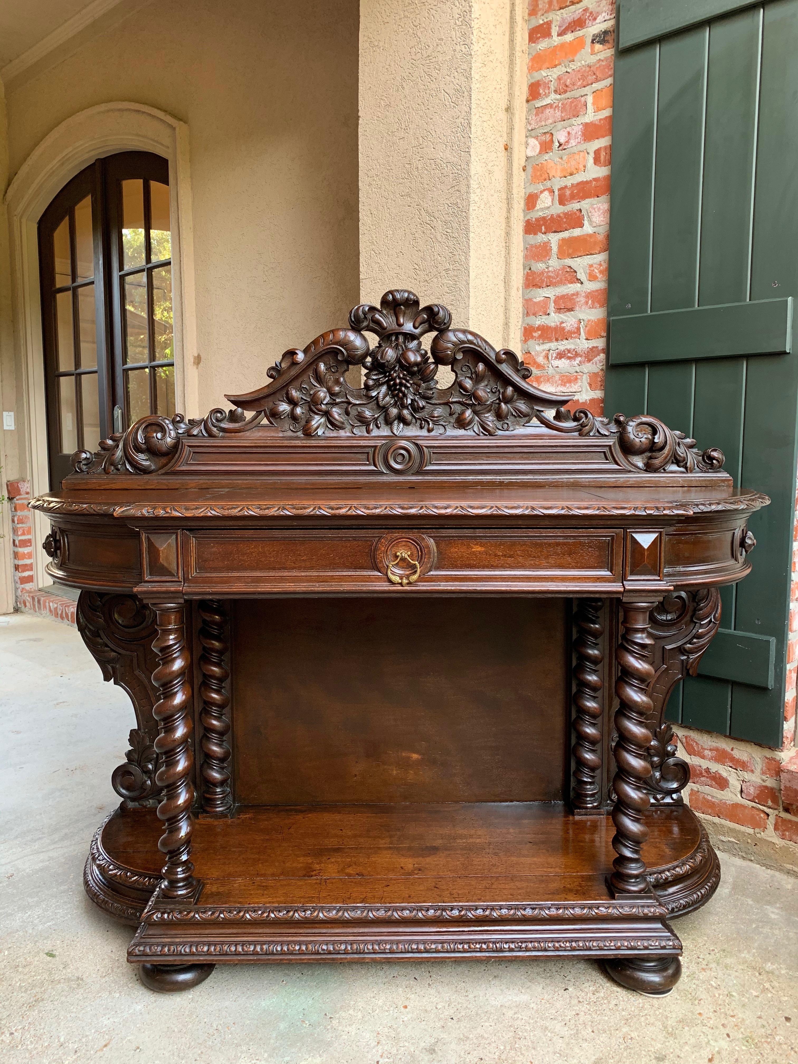~Direct from France~
~From a French estate to you, this stunning antique French carved server is loaded with carved features and quality craftsmanship!~
~The upper back crown is huge, with hand carved dimensional fruits and foliate scrolls. Note