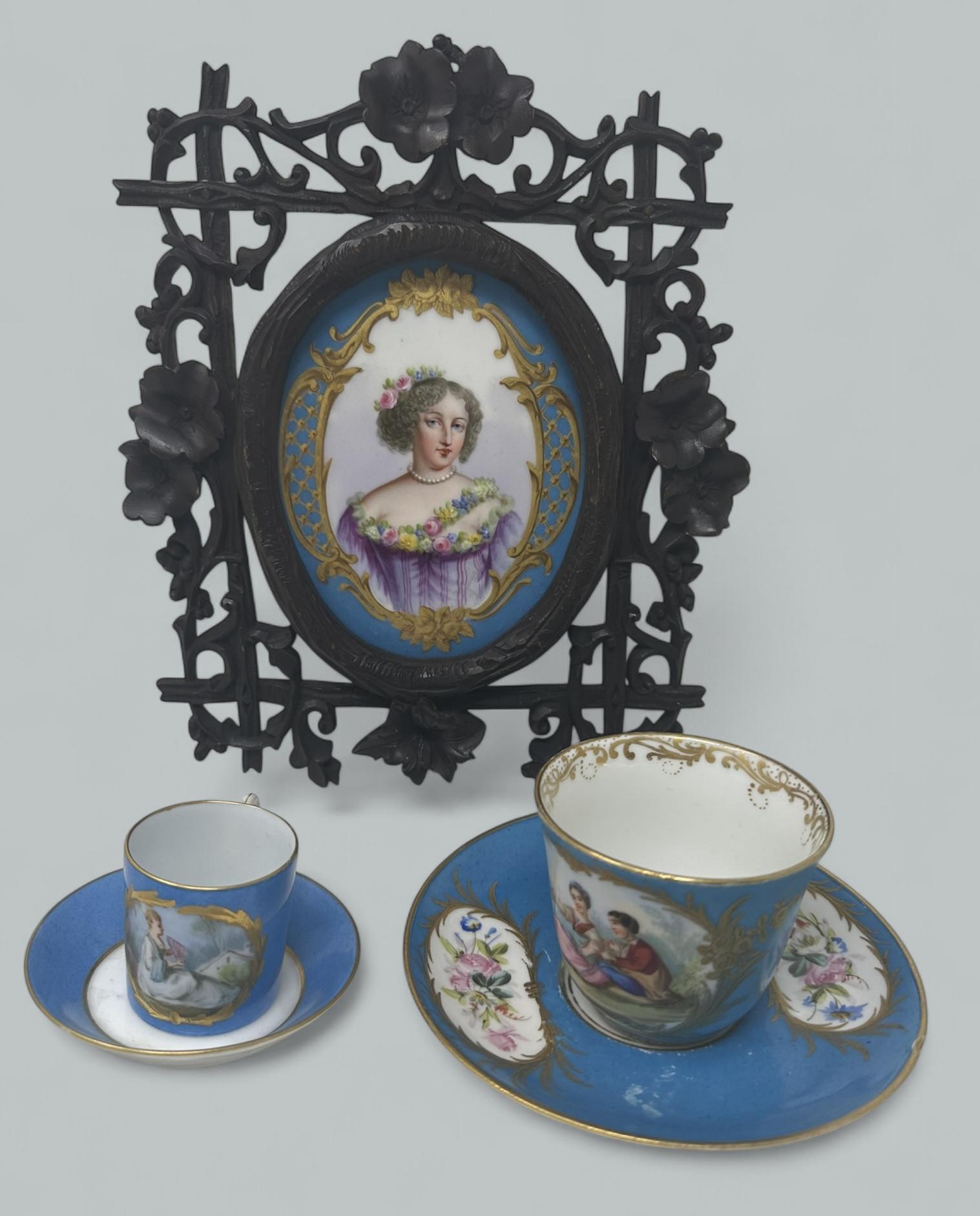 Stunning French Sevres Soft Paste hand decorated Rich Celeste Blue Porcelain Portrait of French Dutchess of Fontanges enclosed within its original quite rare hand carve polished oak frame. Late Nineteenth Century. Signed at back “De Fontanges