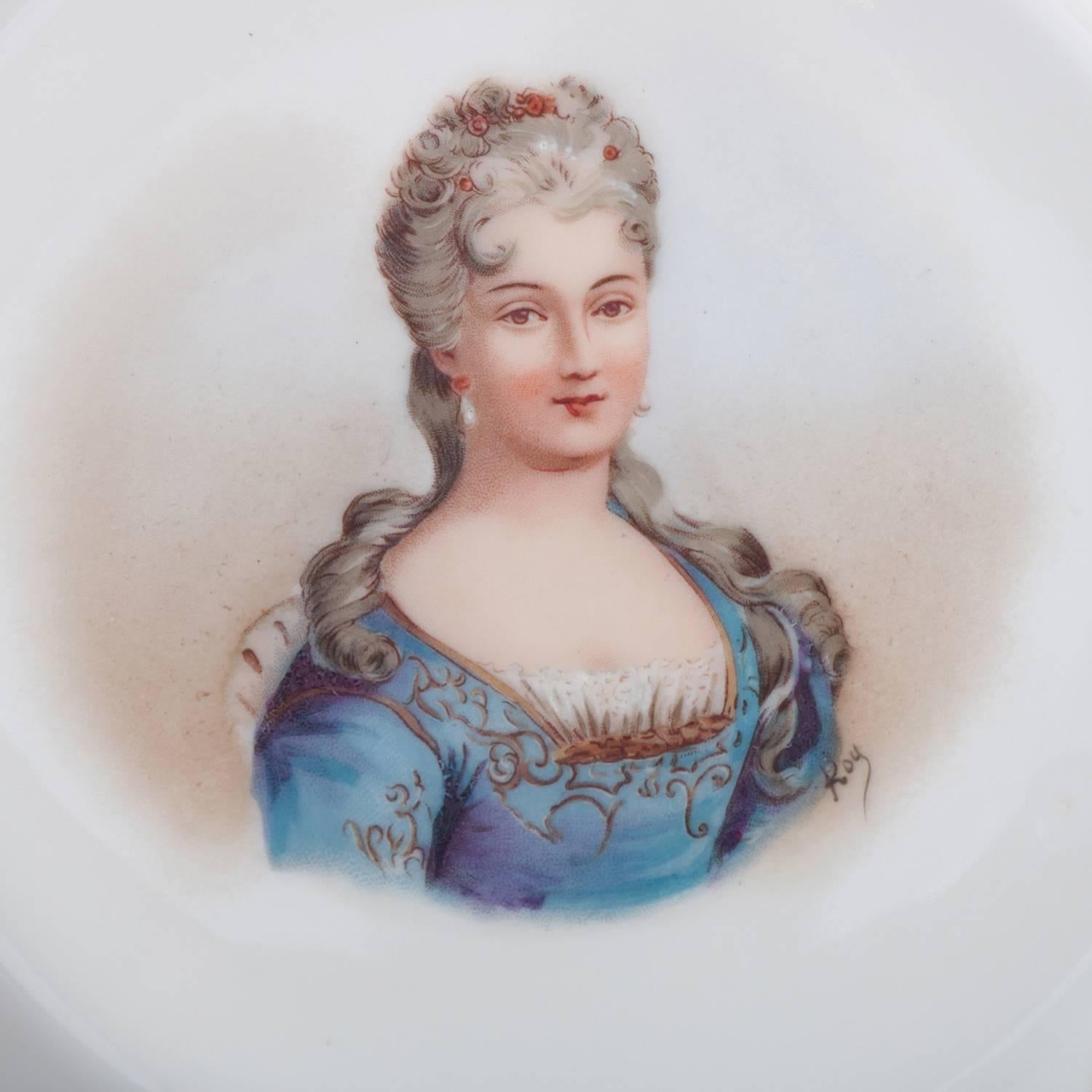 Antique French Sevres porcelain hand painted porcelain portrait plate features central portrait artist signed Roy lower right, scalloped border with floral reserves and gilt foliate and scroll accents, en verso with Sevres double 