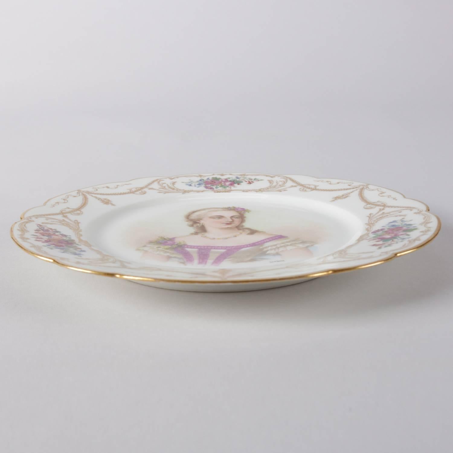 Antique French Sevres porcelain hand-painted porcelain portrait plate features central portrait signed lower right Debrise, scalloped border with floral reserves and gilt garland and scroll accents, en verso with Sevres stamp, 