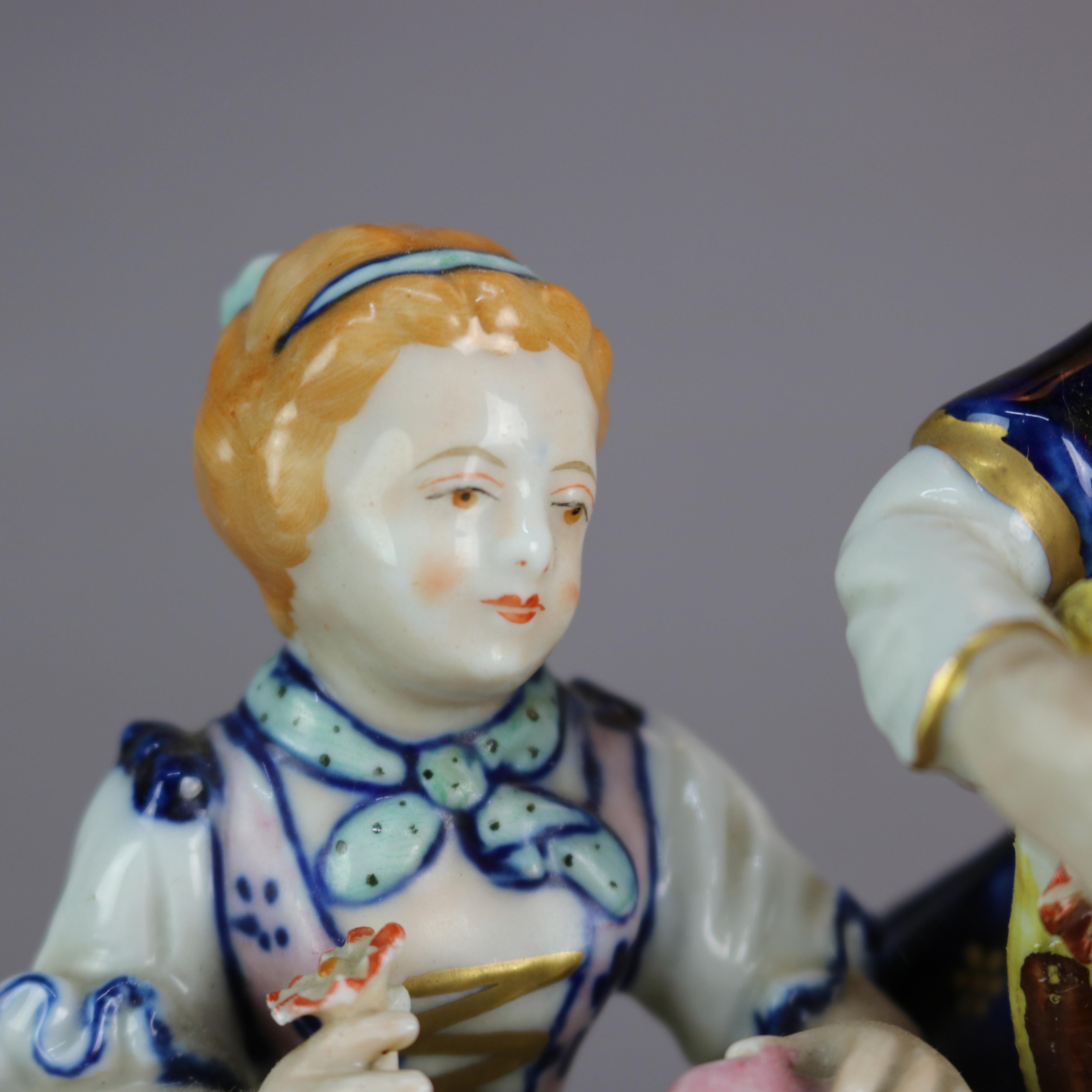 An antique French Sevres porcelain figural grouping depicts hand painted courting scene of boy and girl in countryside setting, raised on foliate cast plinth, gilt highlights, marked on base as photographed, c1880

Measures: 6.5