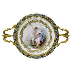 Ancienne assiette Tazza en porcelaine de Sèvres ornée de bronze doré et champlevé.