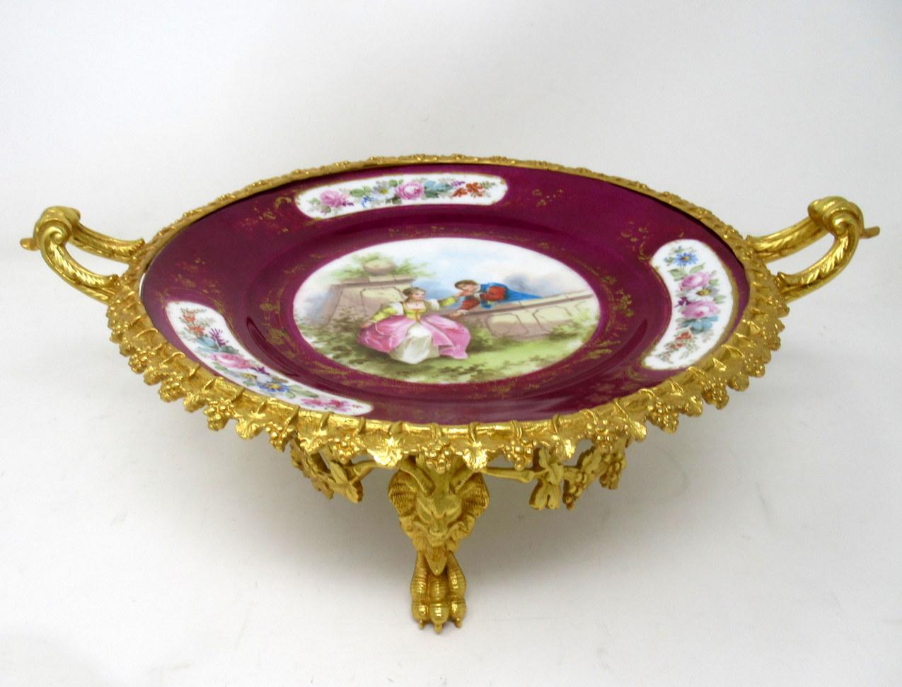An exceptionally well cast french mounted ormolu and hand painted porcelain sevres circular tazza of traditional form, possible from the third quarter of the 19th century. 

The central reserve with hand painted decoration depicting a Romantic