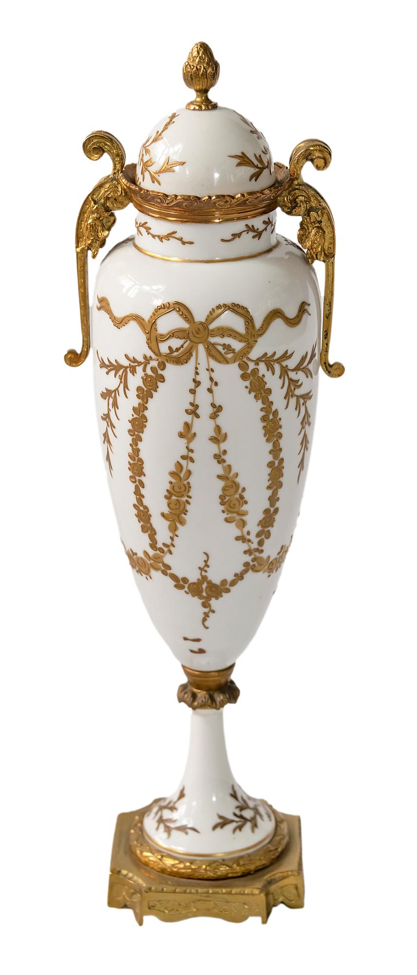 Antique French Servres porcelain vase with hand painted decor and bronze details.
Marked on the bottom and the lid. 