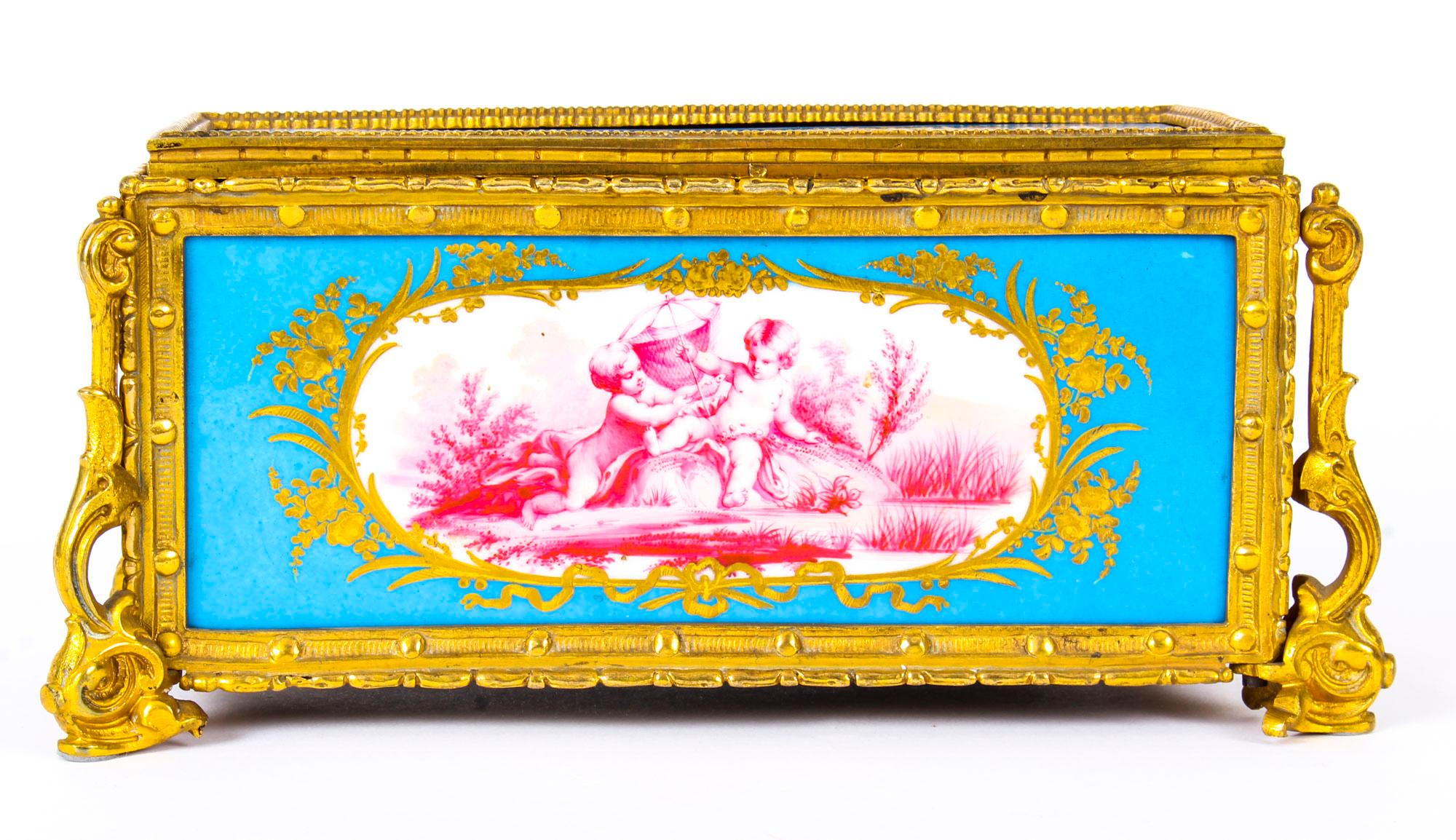This is a fabulous antique French Ormolu and Sevres Porcelain jewelry casket, circa 1870 in date.

This magnificent casket is rectangular in shape, with the top as well as each side exceptionally well decorated with superb Sevres Porcelain panels