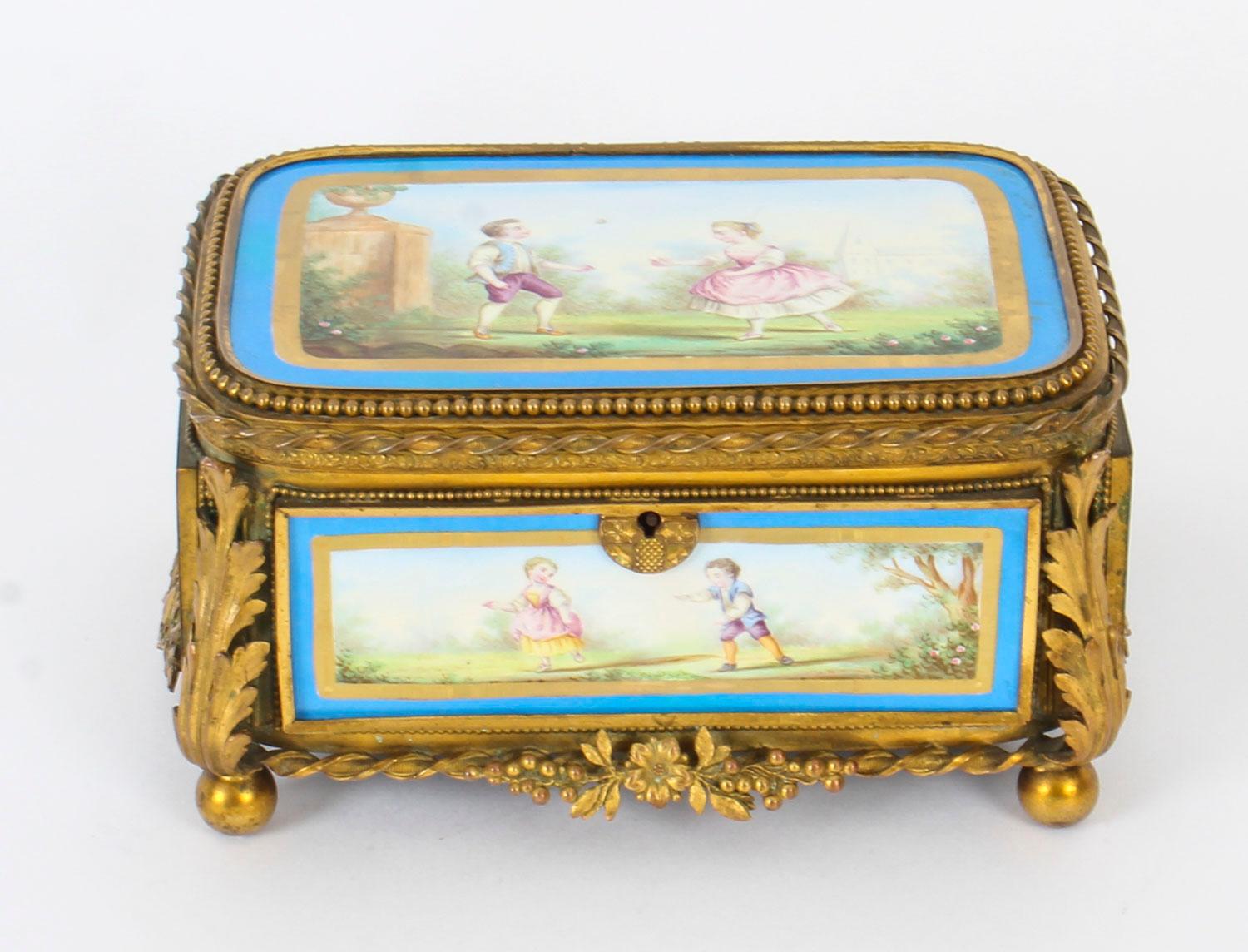 This is a fabulous antique French Ormolu and Sevres Porcelain jewellery casket, circa 1860 in date.

This magnificent casket is rectangular in shape with the top and each side exceptionally well decorated with superb ormolu mounts in the form of