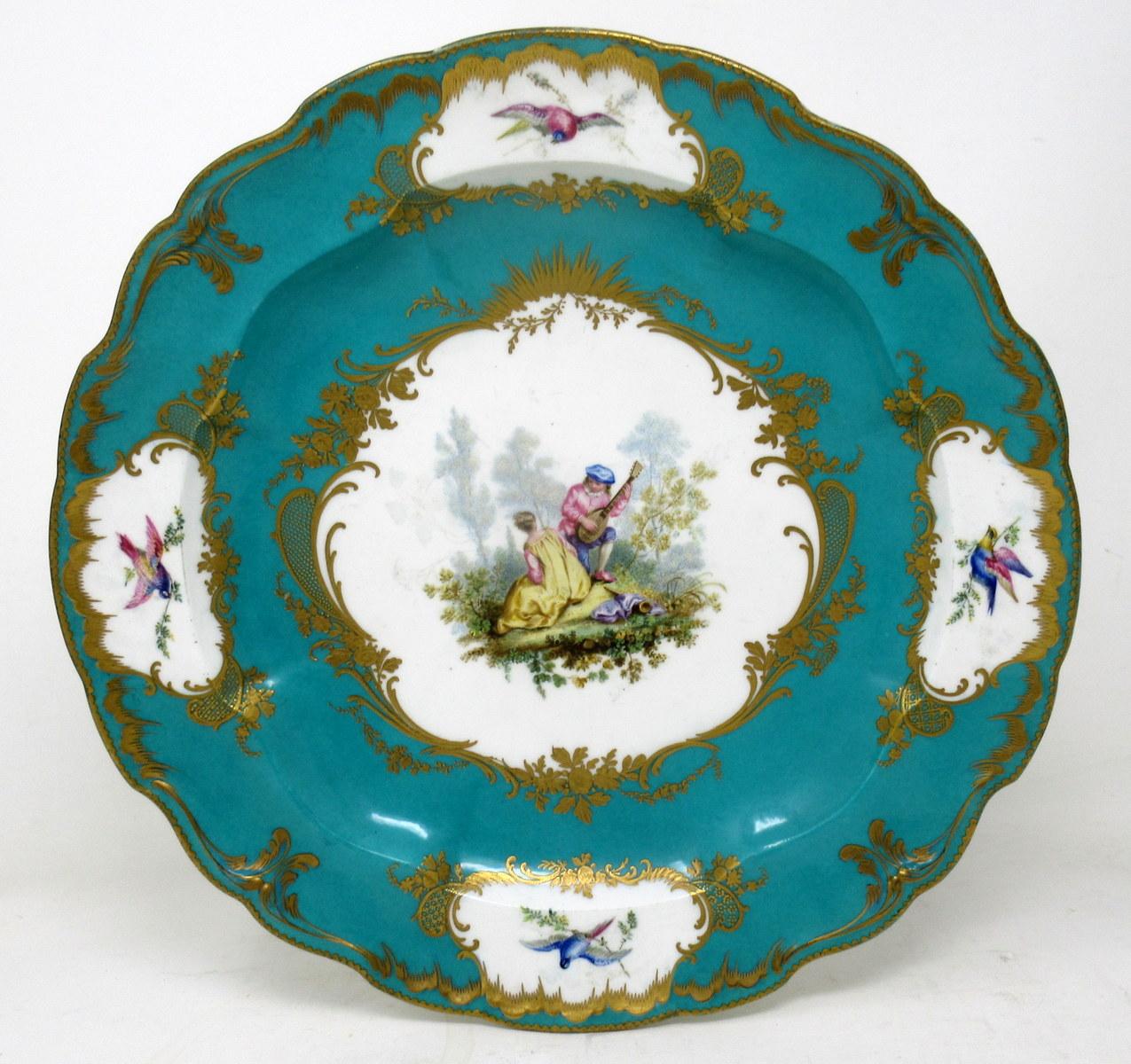 An exceptionally well hand painted French sevres style soft paste porcelain circular centerpiece, deep dish or cabinet plate of large proportions, last half of the nineteenth century, possibly earlier. 

The central reserve with an exquisite hand