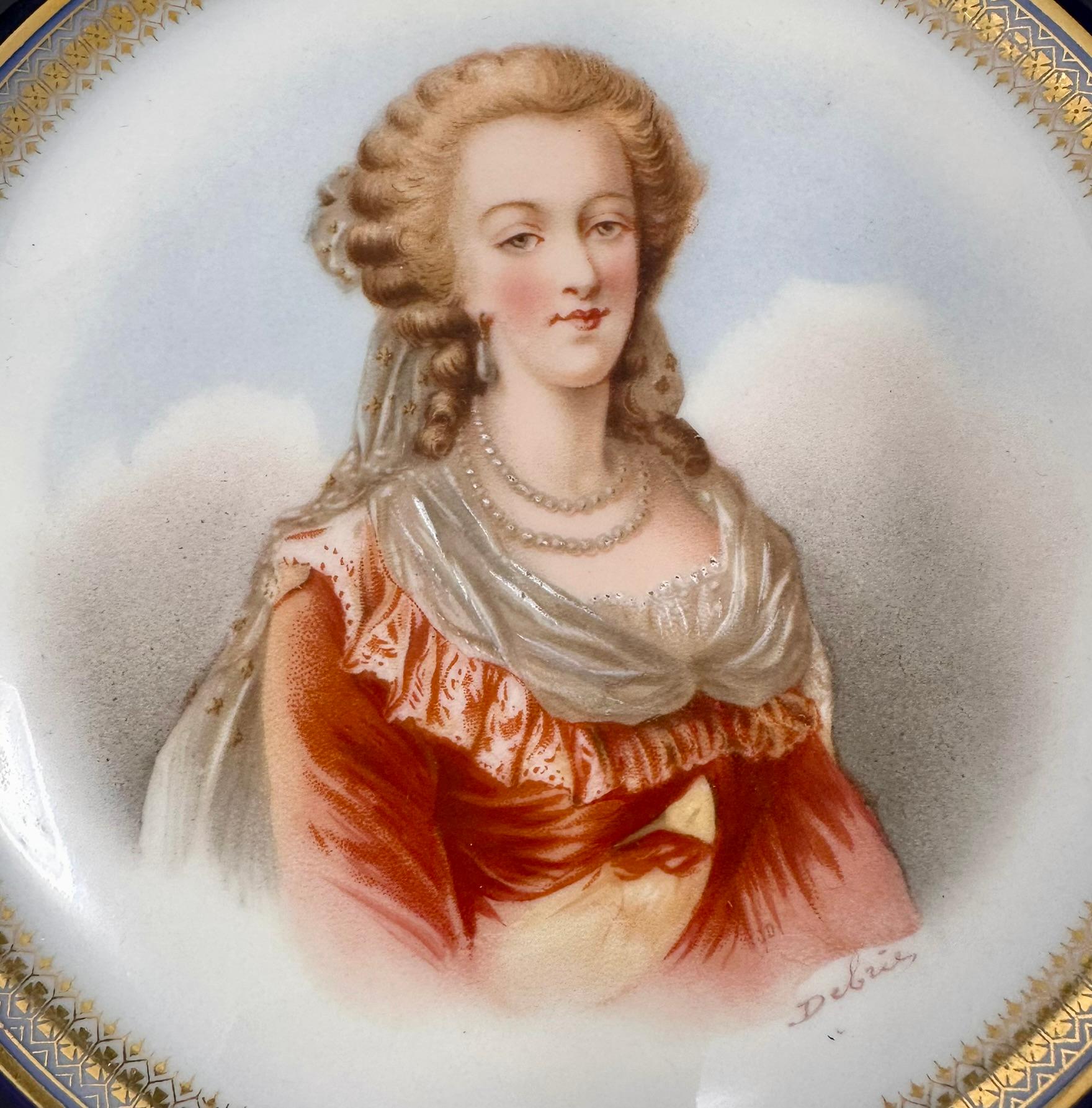 Antique French Sevres Château de Saint-Cloud Porcelain Portrait Plate of Marie Antoinette, Signed DeBrie, Circa 1846.
Pristine plate in cobalt blue and cream with intricately hand-painted gold leaf details. 
We also have the companion plate to this
