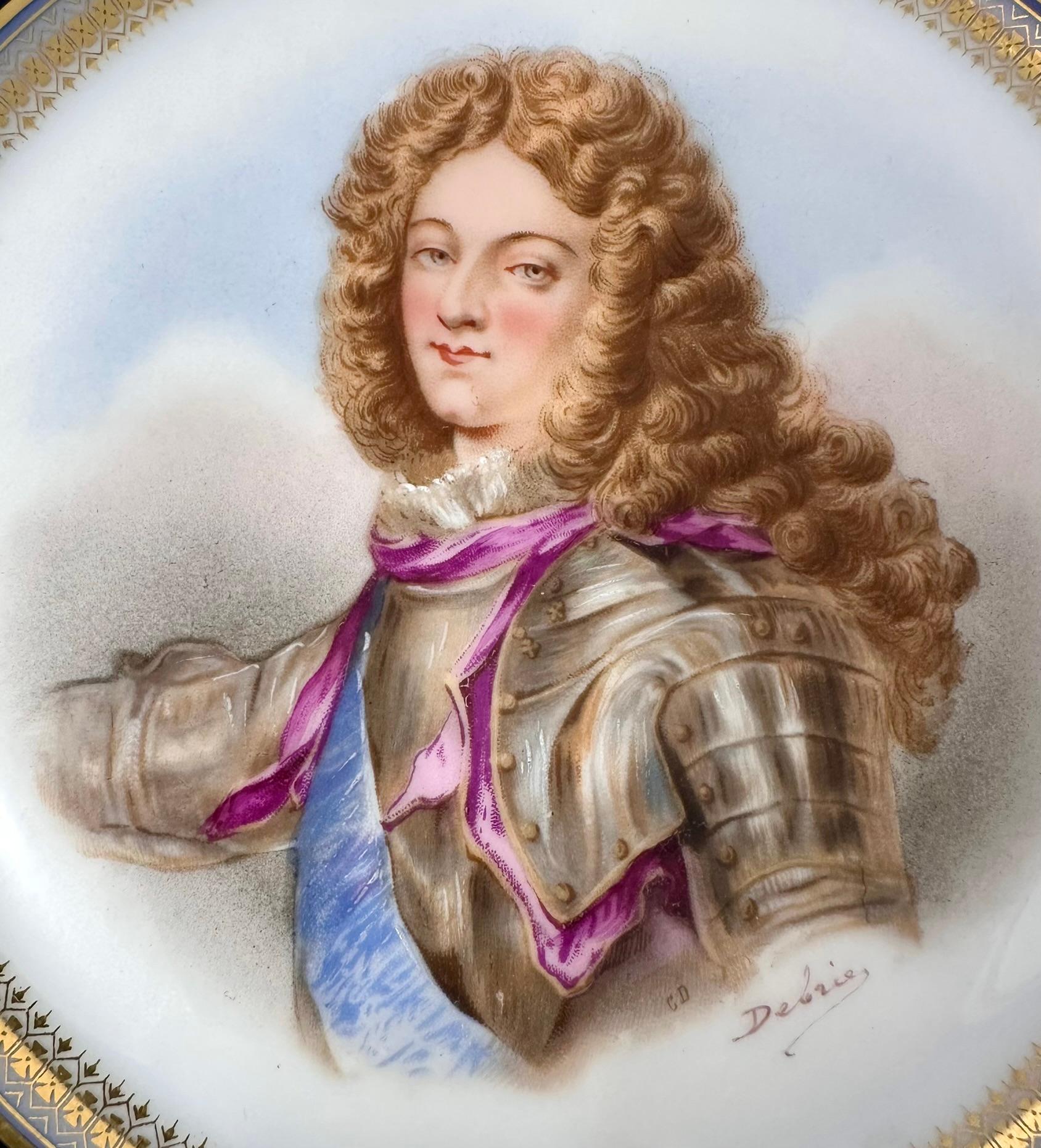 Antique French Sevres Château de Saint-Cloud Porcelain Portrait Plate of Louis, Duke of Burgundy.  Signed DeBrie, Circa 1846.
Pristine plate in cobalt blue and cream with intricately hand-painted gold leaf details.
We also have the companion plate