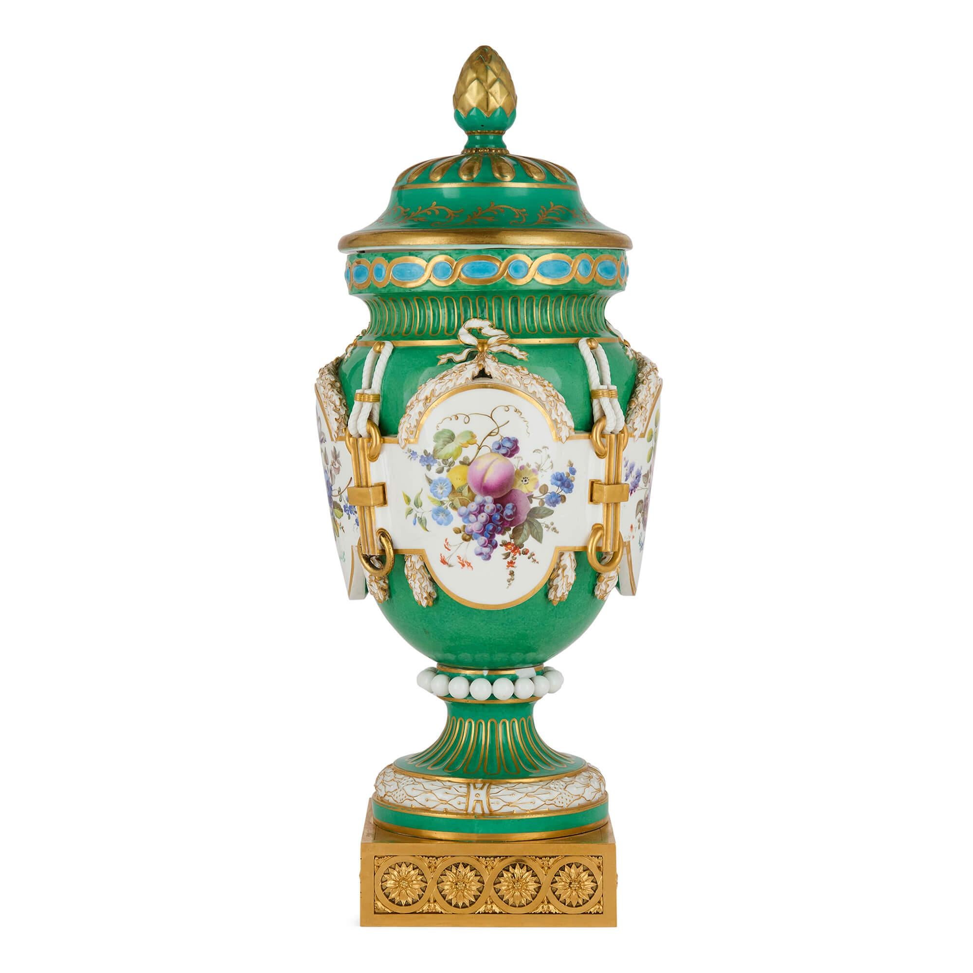 Antique French Sèvres-style ormolu mounted porcelain mantel clock 
French, 19th Century 
Height 50cm, diameter 21cm

This superb 19th century porcelain clock pays homage to the distinguished artistry of the famed Sèvres porcelain manufactory.

The