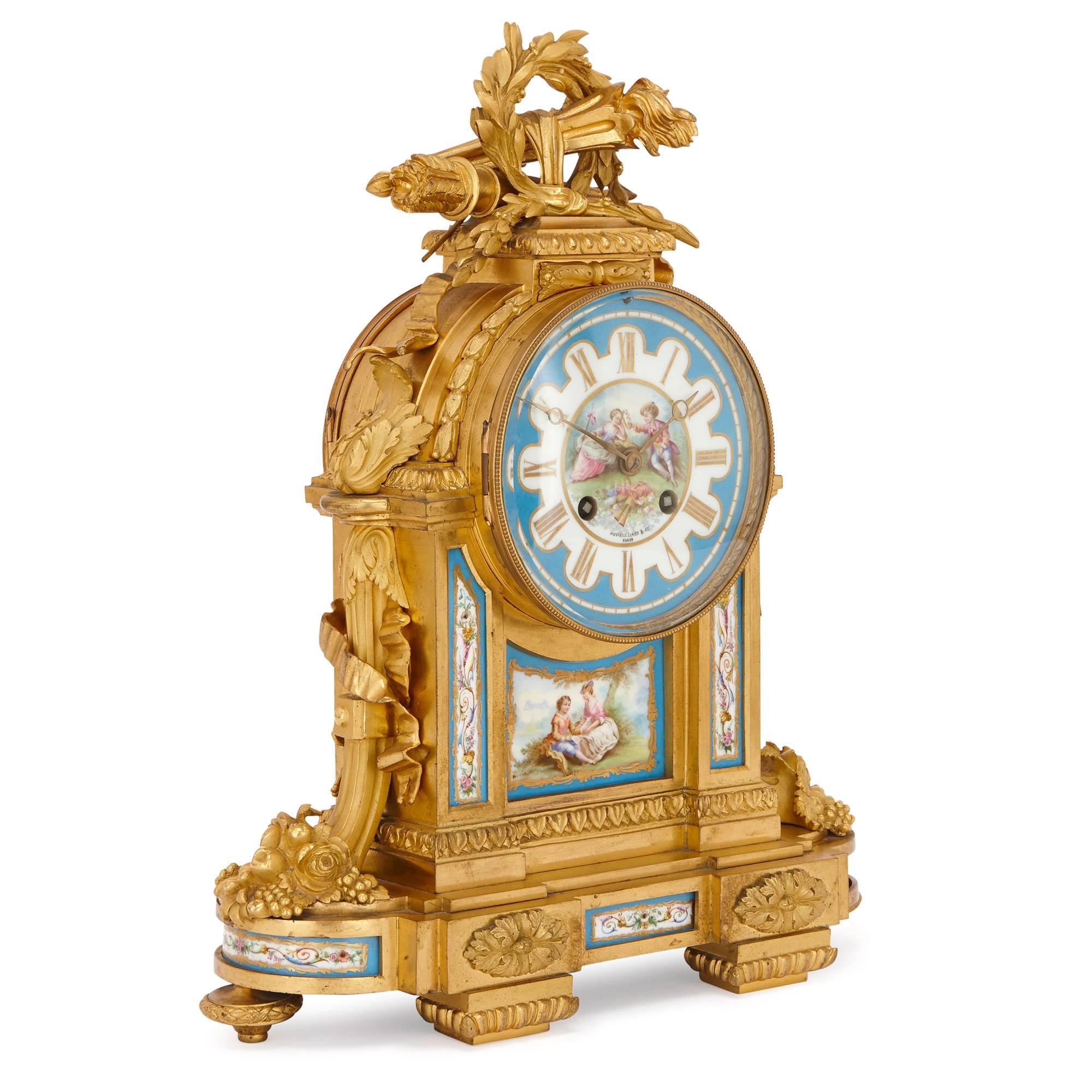 The combination of sumptuous, lustrous ormolu and finely decorated Sevres style porcelain makes this mantel clock an exceptional piece. Built in France and retailed by the prestigious London-based jewellery firm Howell James & Co in the 19th