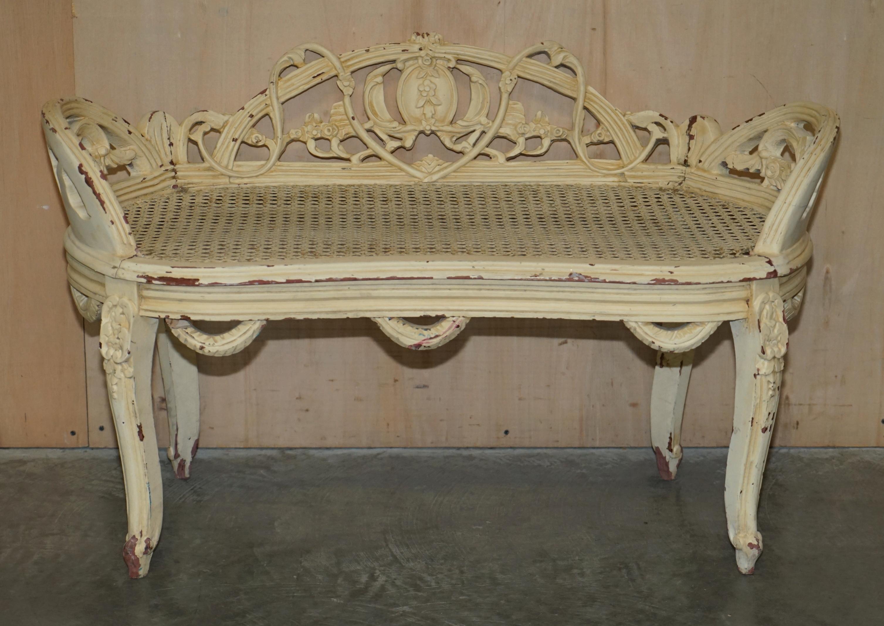 We are delighted to offer for sale this stunning original circa 1880 Napoleon III Louis XVI style bergère window seat bench with original shabby chic paint 

This is a truly stunning piece, very comfortable ornately carved all over and with the