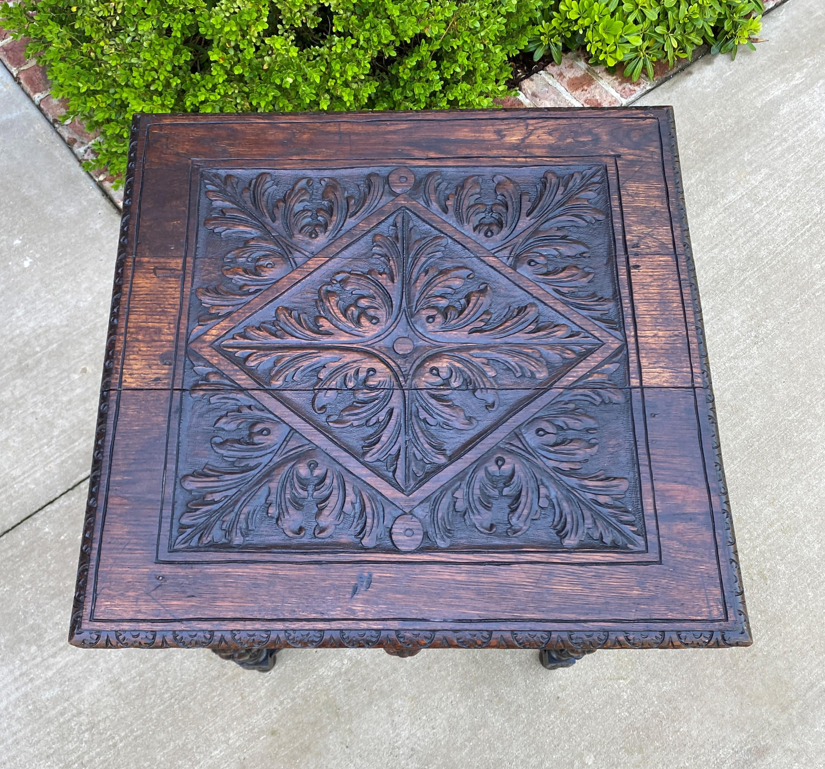 EXQUISITELY CARVED Antique French Oak SQUARE Entry, Library, Hall, Side or End Table with Drawer ~~c. 1880s

Charming Renaissance Revival table with drawer~~carved top with mask pull~~carved on all 4 sides and lower X-shaped stretcher~~perfect for