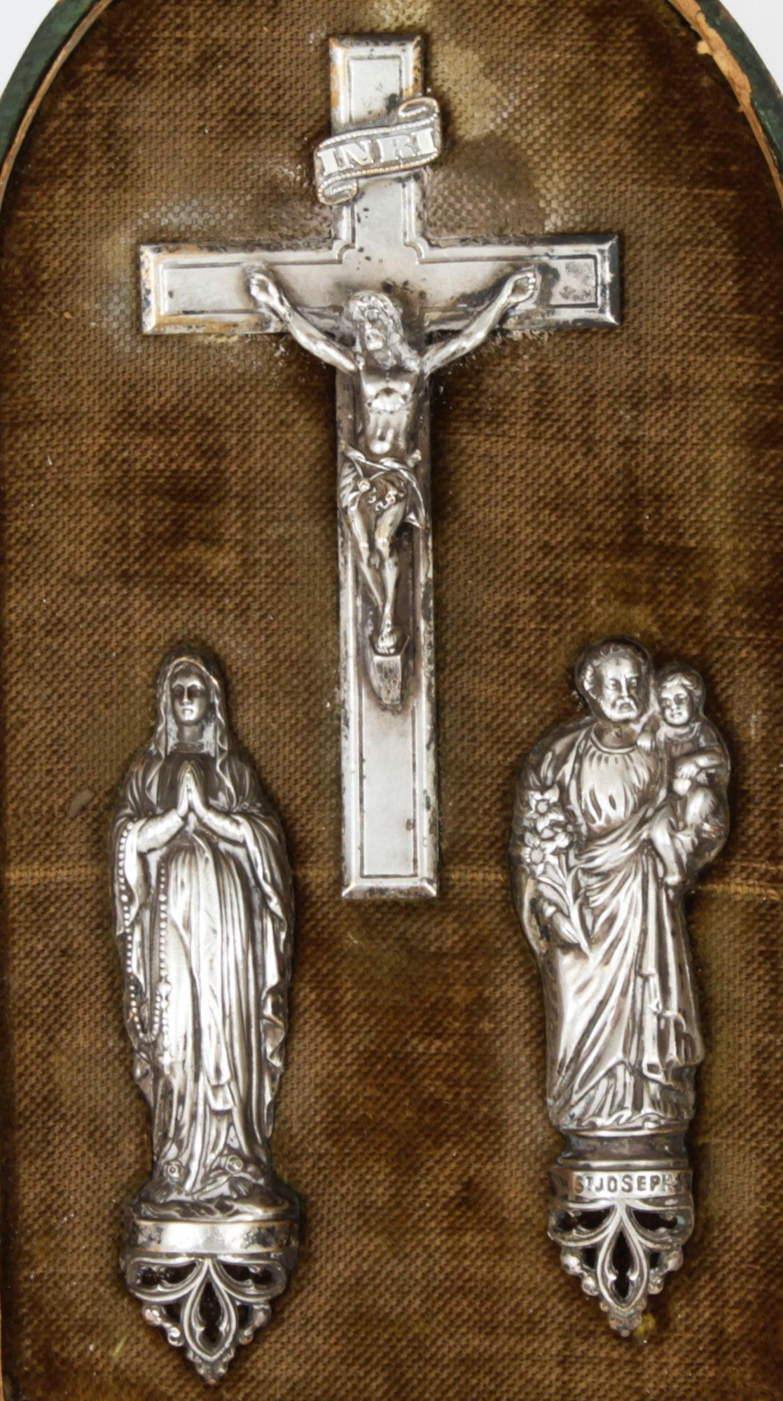 This is a distinctive antique French silver communion set, comprising a corpus Christi, St Mary and St Joseph, Circa 1880 in date.

The communion set is beautifully displayed in the original leather triptych easel case.
 
The craftsmanship is second
