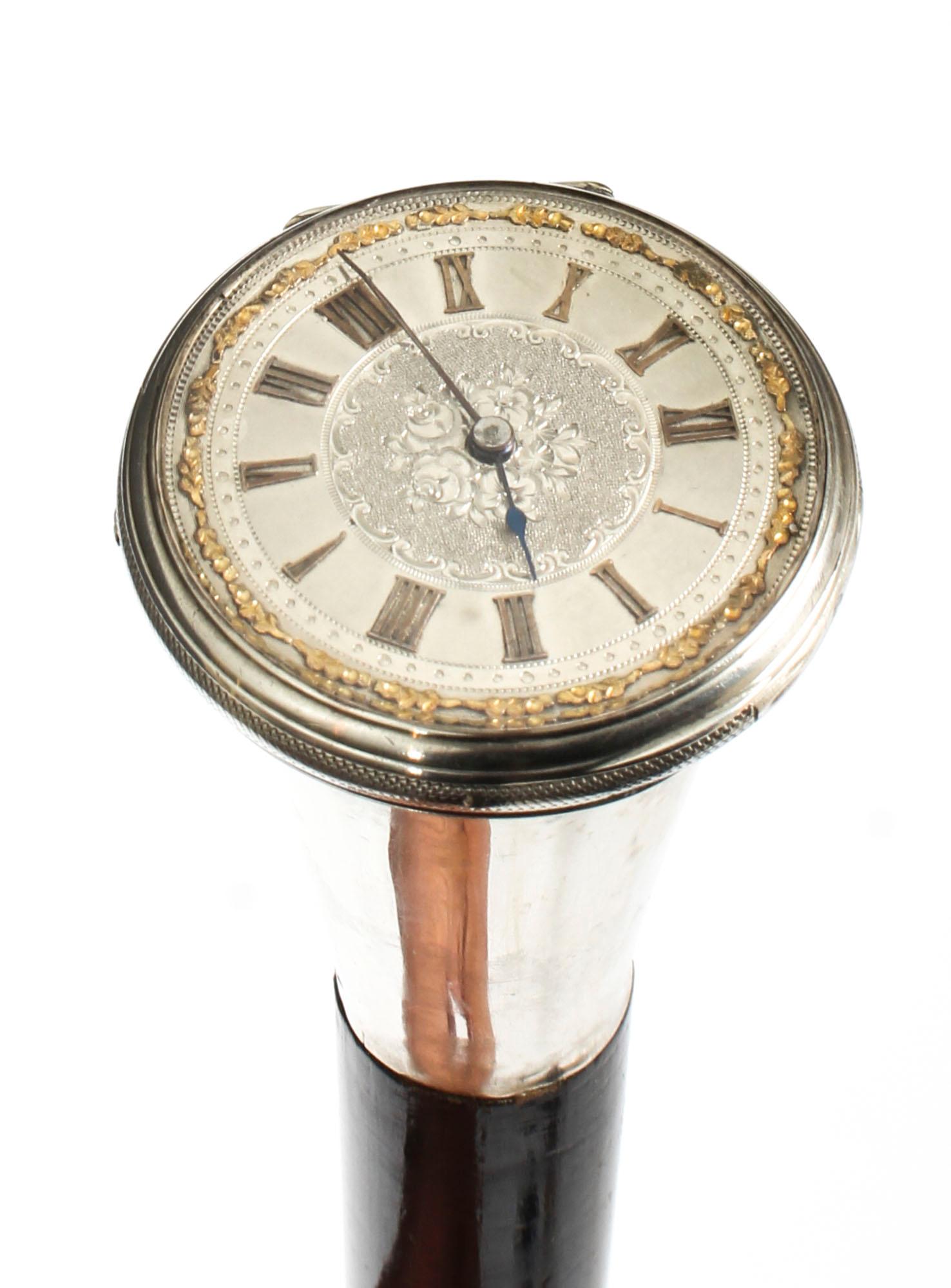 This is a beautiful and distinctive antique French Gentlemans ebonized walking stick watch with the exquisite silver watch fashioned into the handle, dating from circa 1880.

The watch having a decorative silvered dial and cylinder escapement. The
