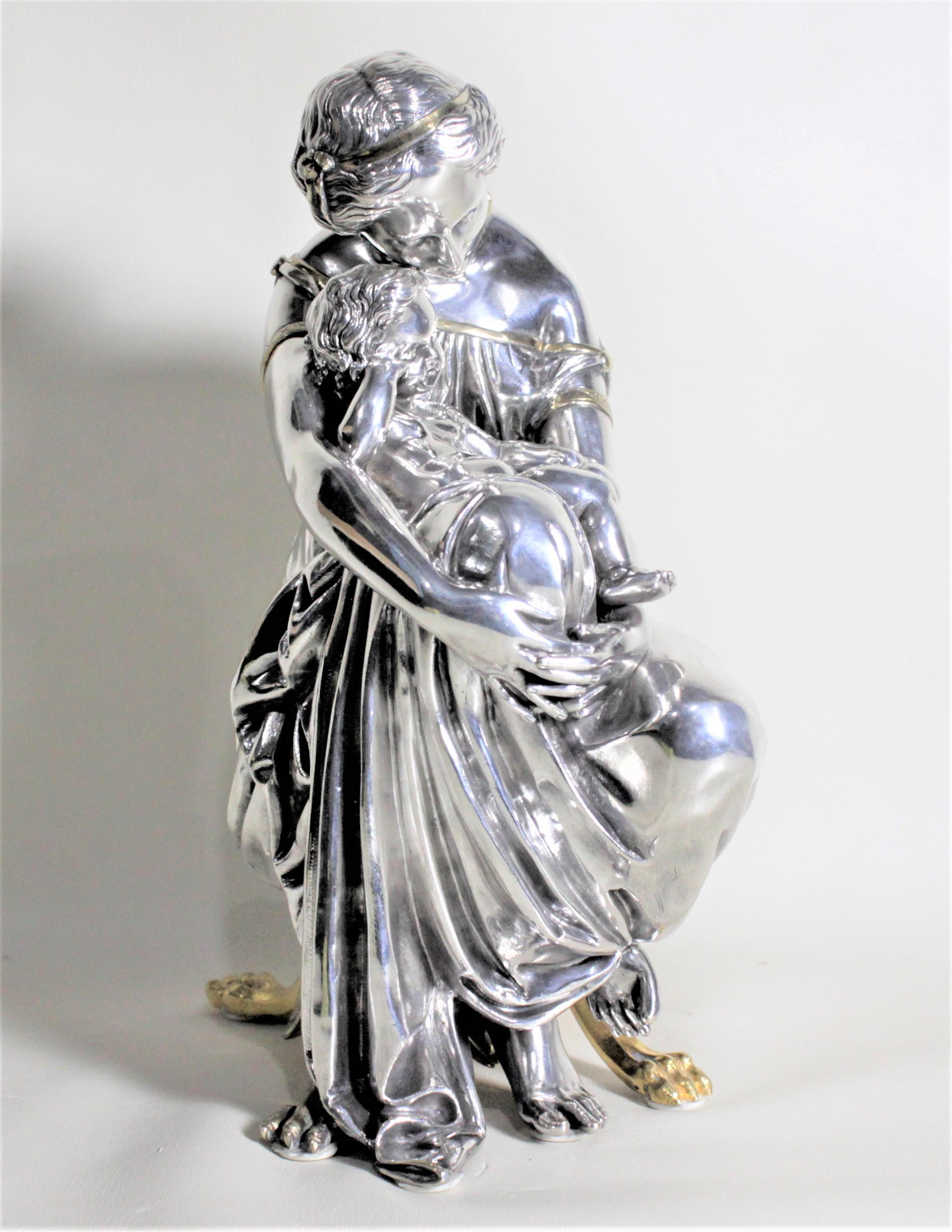 Antique French Silver & Gilt Finished Bronze Sculpture of a Seated Mother & Baby In Good Condition For Sale In Hamilton, Ontario