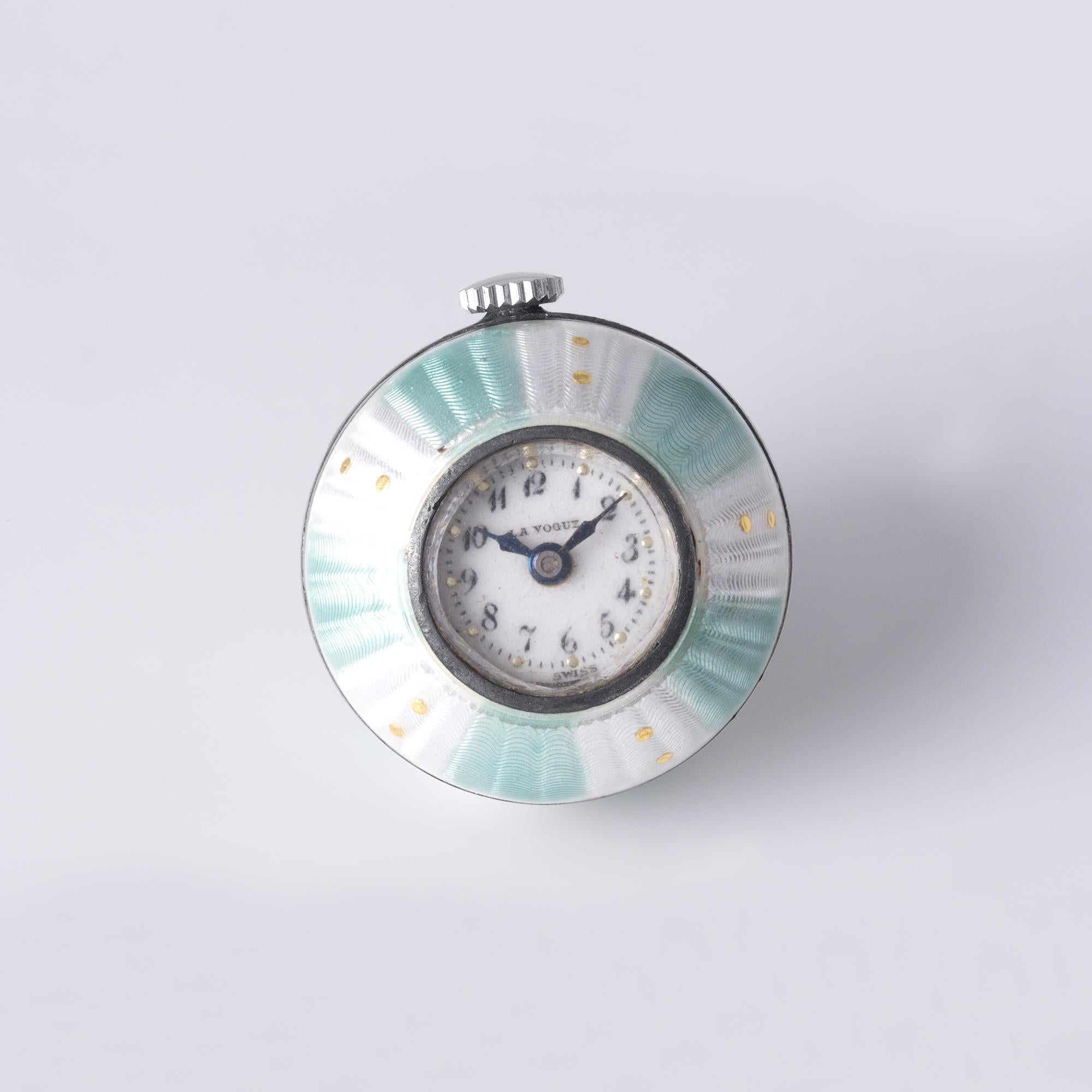 Vintage Charm: Mint Green Enamel Clock Pendant ✨

Add a touch of whimsy and timeless elegance to your jewelry collection with this delightful mint green enamel clock pendant. A perfect fusion of vintage appeal and functional charm, this piece is as